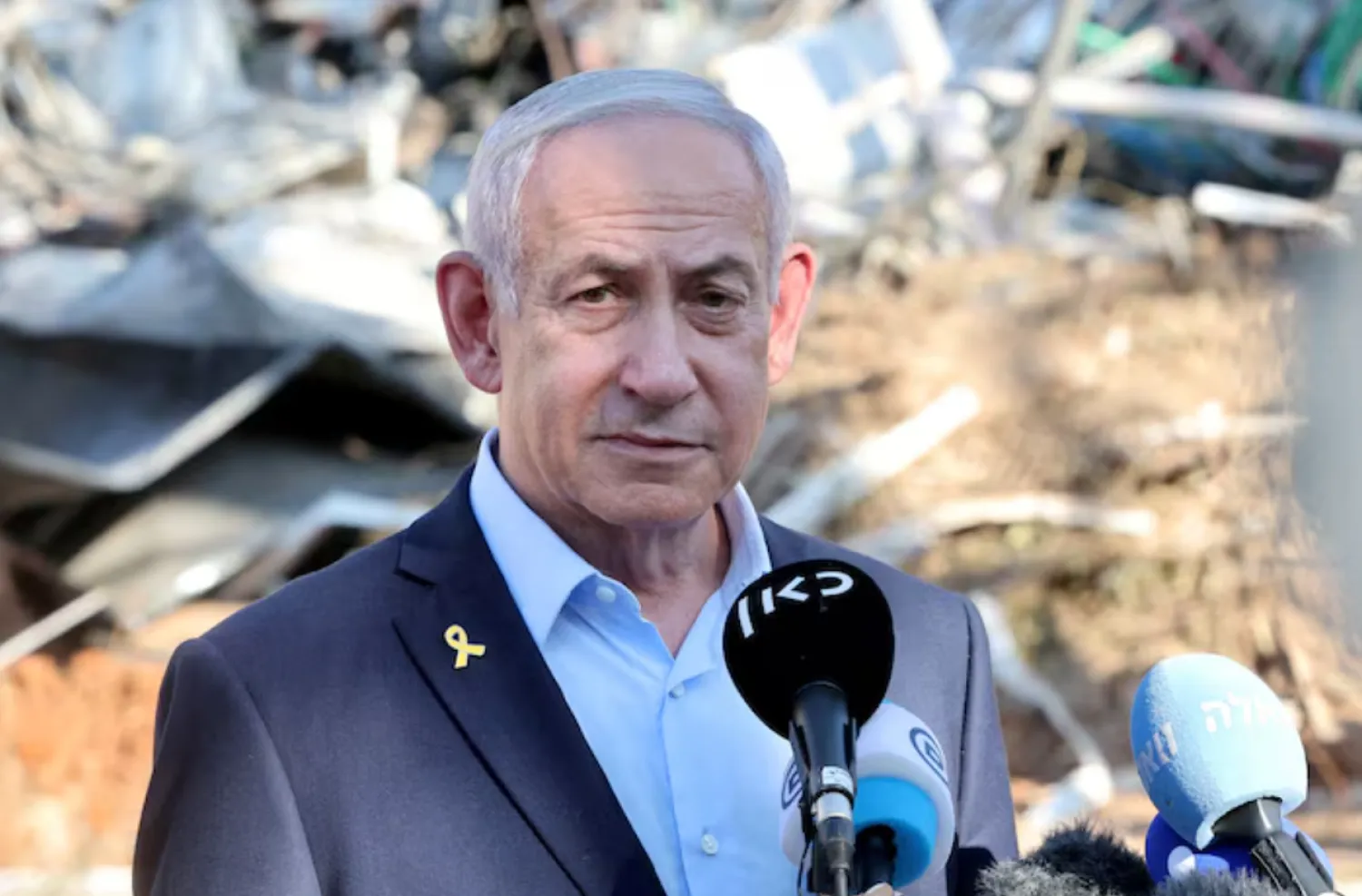 Israel's Prime Minister Benjamin Netanyahu gives a statement during a visit to the site of the Weizmann Institute of Science, which was hit by an Iranian missile barrage, in the central city of Rehovot, Israel June 20, 2025. JACK GUEZ/Pool via REUTERS/File Photo 
