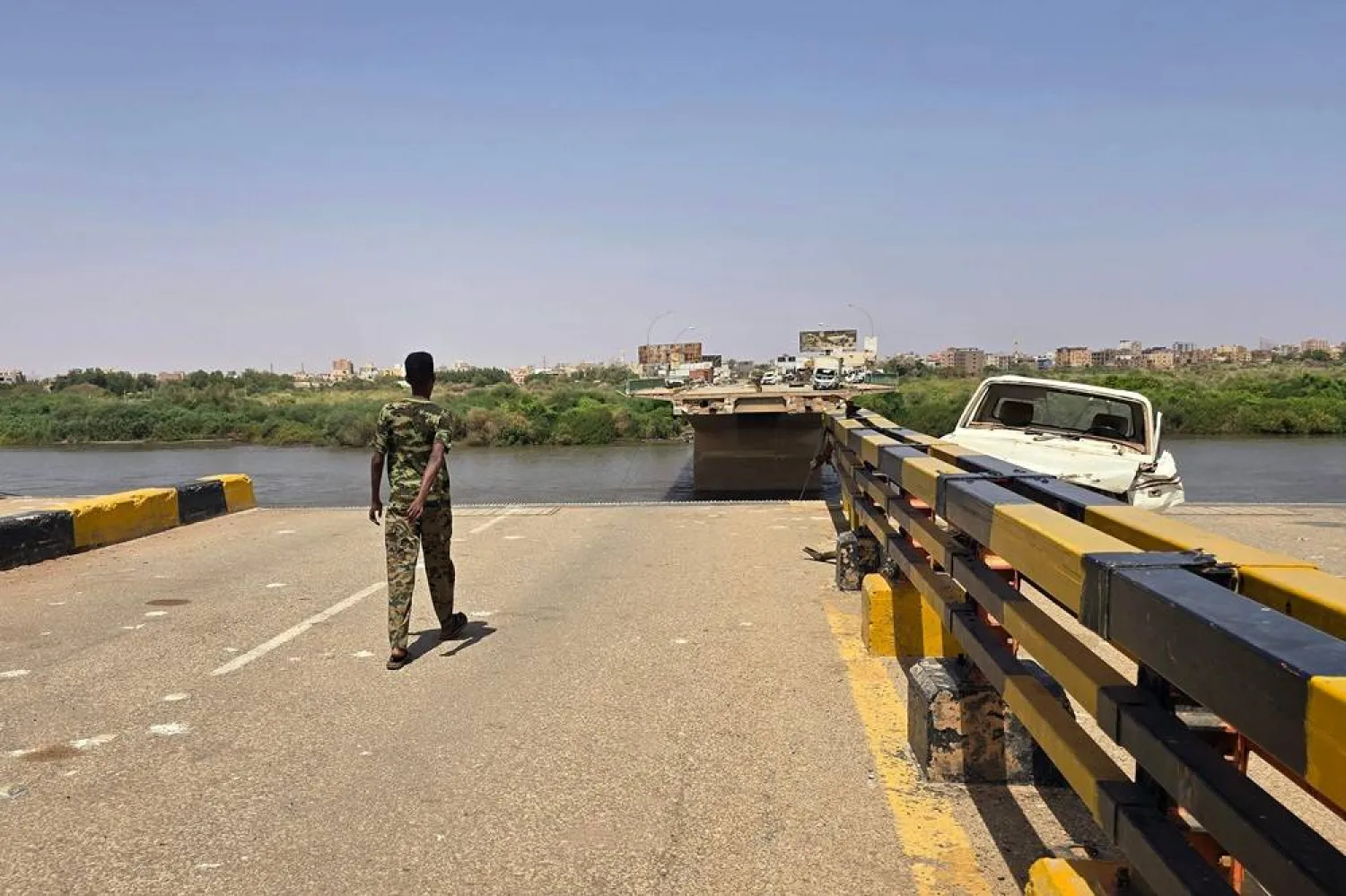 The remains of the Shambat Bridge, which connects Omdurman and Bahri, on June 24, 2025 in the Sudanese capital region. (AFP)