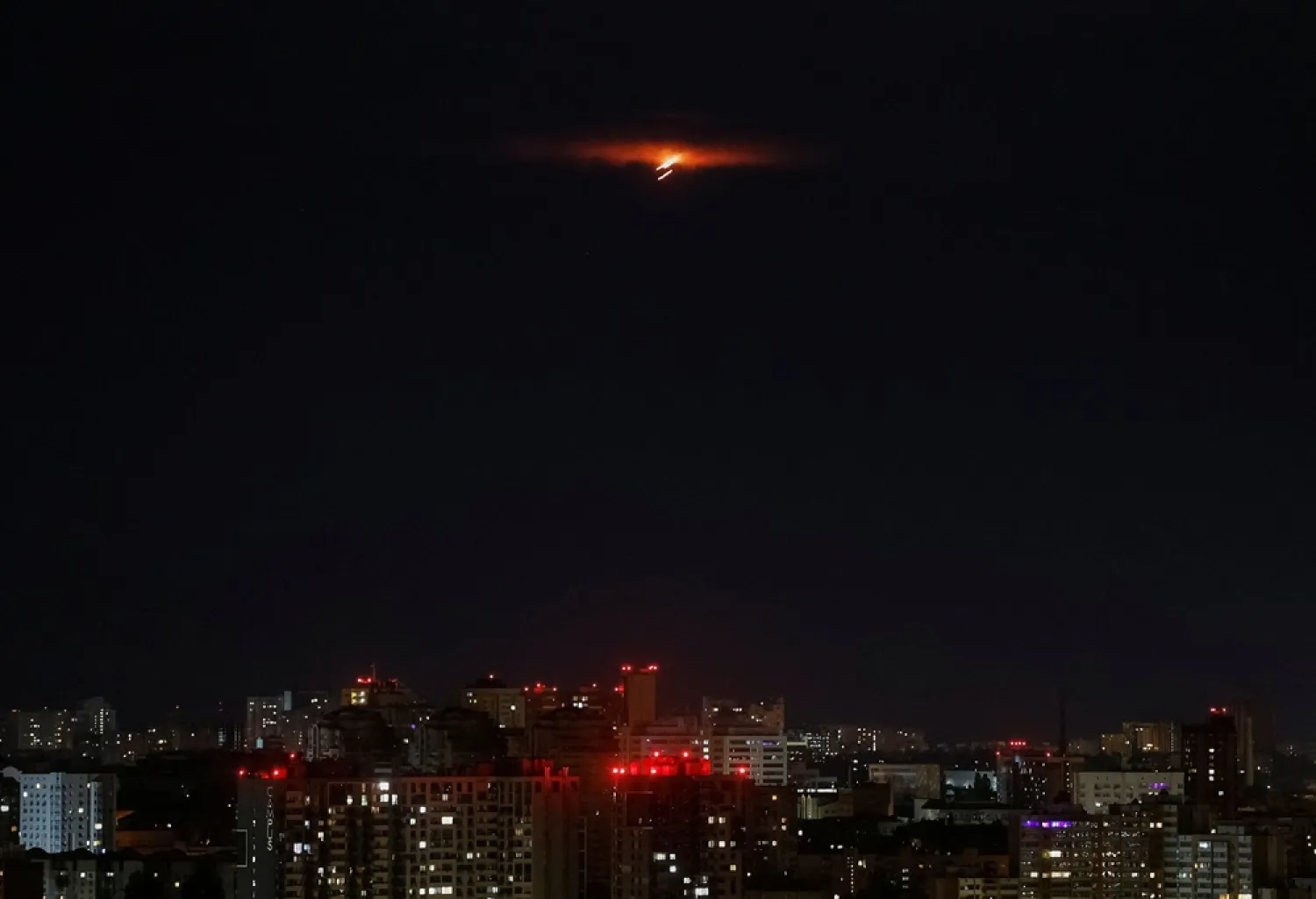 Explosion lights up the sky over the city during a Russian drone, amid Russia's attack on Ukraine, in Kyiv, Ukraine June 29, 2025. (Reuters) 