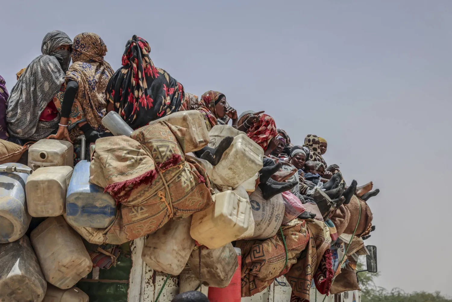 Refugees arrive at the Tine transit camp in Chad's Wadi Fara province Saturday, May 3, 2025. (AP Photo/Caitlin Kelly)