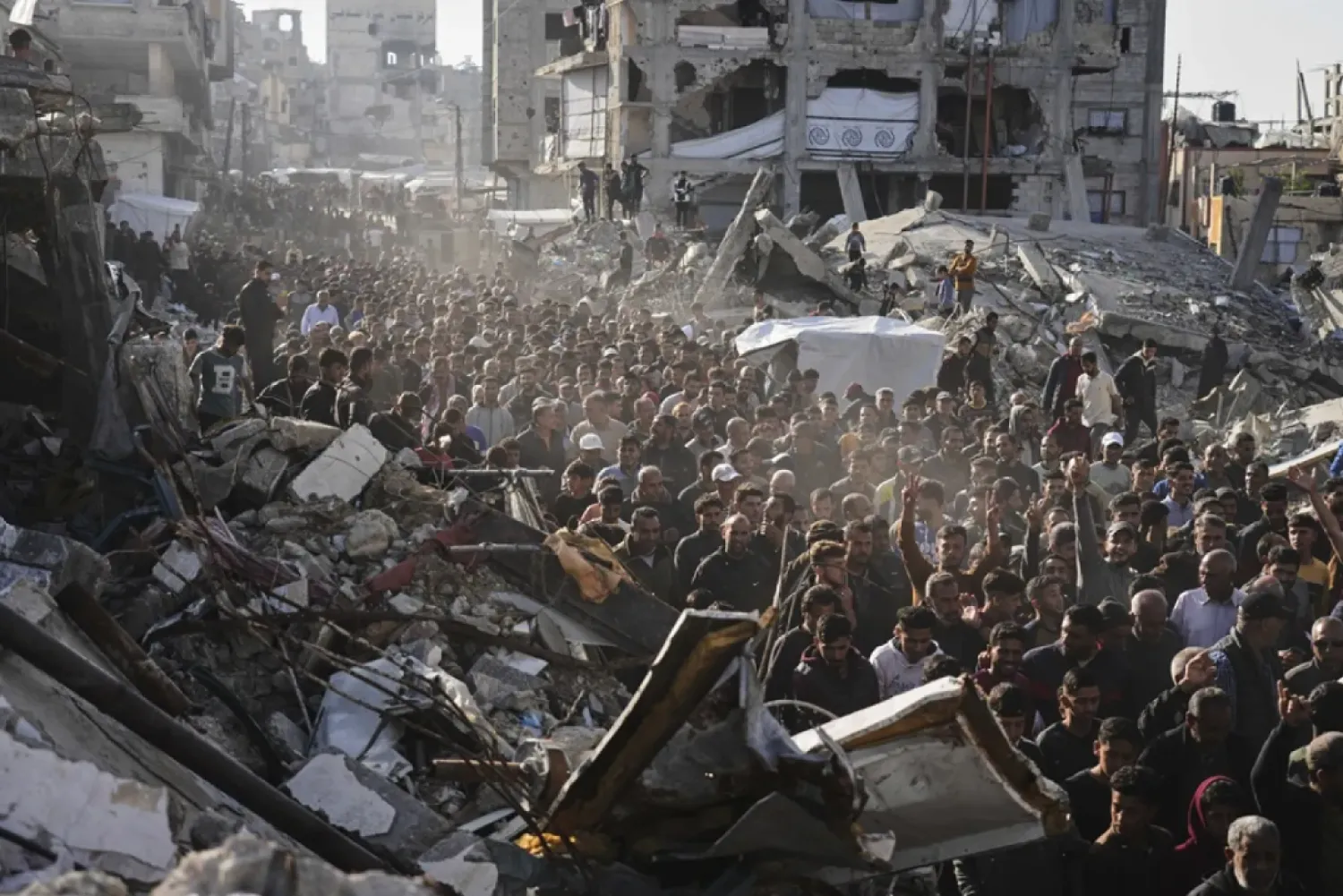 Palestinians attend an anti-war protest and against Hamas in a rare show of public anger against the group that rules the territory, in Beit Lahiya, northern Gaza Strip, Wednesday, March 26, 2025. (AP)