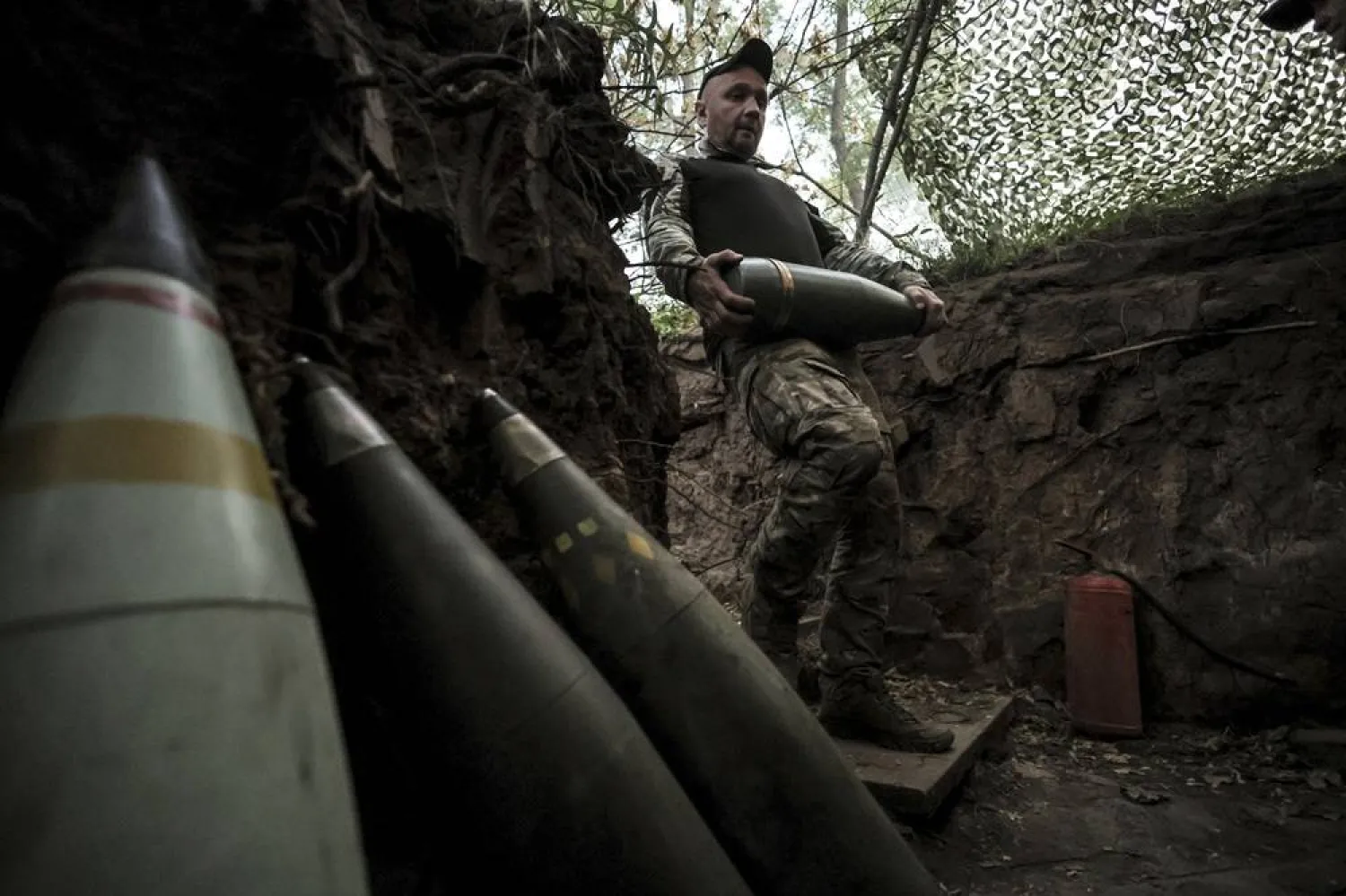 In this photo provided by Ukraine's 24th Mechanized Brigade press service, a serviceman prepares to fire a howitzer toward Russian army positions near Chasiv Yar, Donetsk region, Ukraine, June 14, 2025. (Oleg Petrasiuk/Ukraine's 24th Mechanized Brigade via AP, File) 