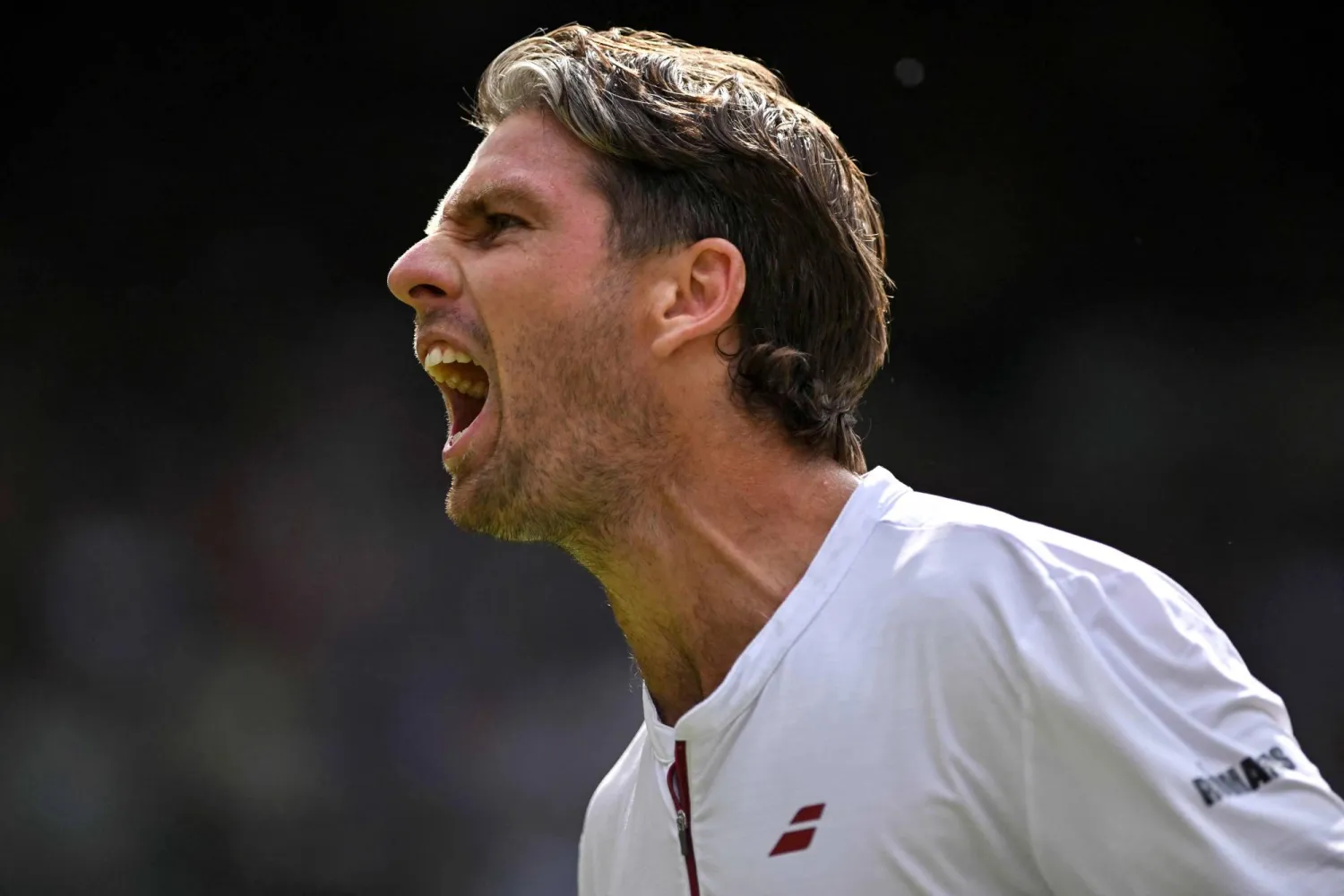 نوري يصرخ فرحاً بعد الفوز (أ.ف.ب)