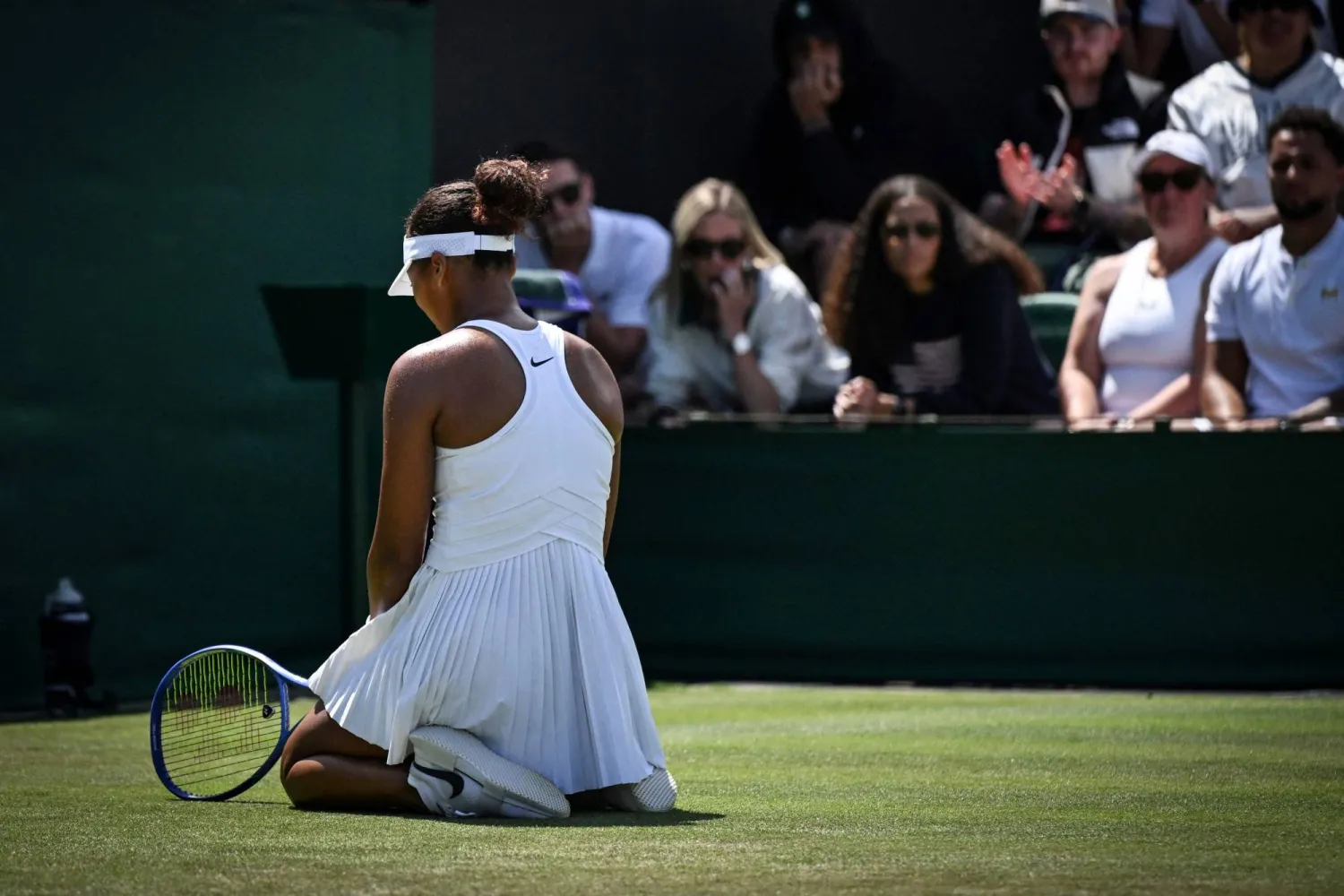 Japan's Naomi Osaka reacts to a missed point Russia's Anastasia Pavlyuchenkova during their women's singles third round tennis match on the fifth day of the 2025 Wimbledon Championships at The All England Lawn Tennis and Croquet Club in Wimbledon, southwest London, on July 4, 2025. (Photo by Kirill KUDRYAVTSEV / AFP) 