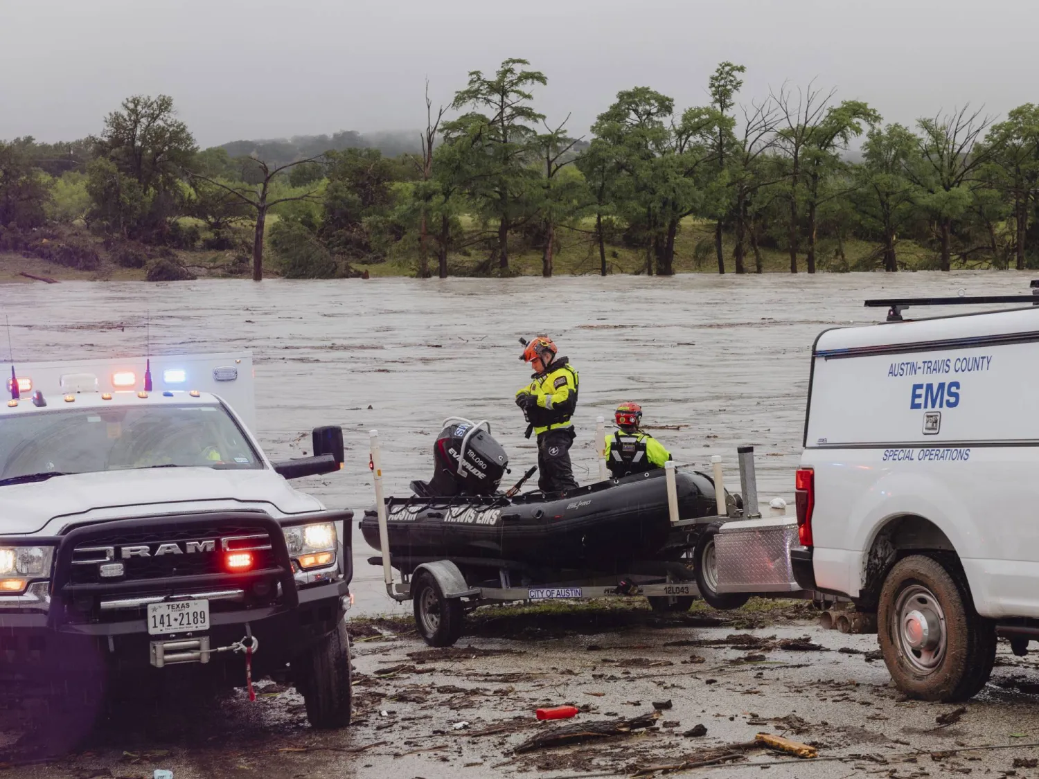Members of Task Force 1 deploy boats along the Guadalupe River in the wake of a destructive flooding event in Kerrville on Friday July 4, 2025. (Christopher Lee/The San Antonio Express-News via AP)