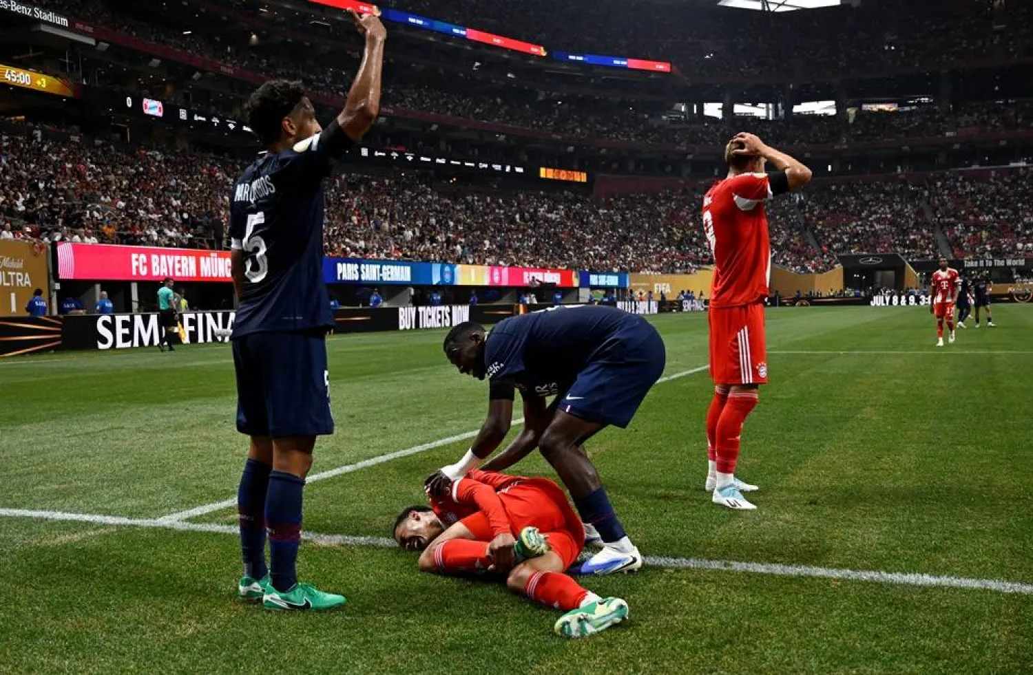 Football - FIFA Club World Cup - Quarter Final - Paris St Germain v Bayern Munich - Mercedes-Benz Stadium, Atlanta, Georgia, US - July 5, 2025 Bayern Munich's Jamal Musiala sustains an injury after a collision with Paris St Germain's Gianluigi Donnarumma. (Reuters)