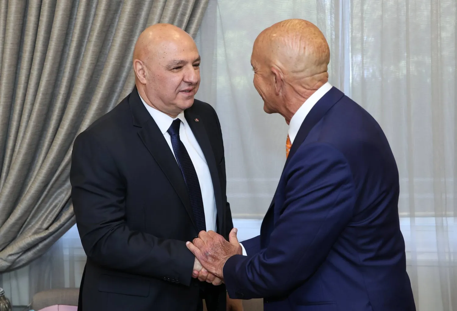 07 July 2025, Lebanon, Beirut: Lebanese President Joseph Aoun shakes hands with Special Envoy to Syria Thomas Barrack ahead of their meeting in the presence of US Ambassador to Lebanon Lisa Johnson, in Beirut. Photo: Lebanese Presidency Office Apai/APA Images via ZUMA Press Wire/dpa
