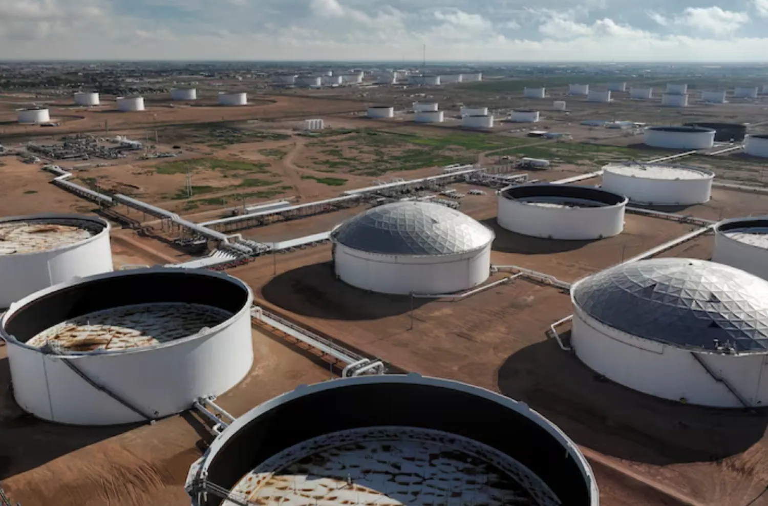 A drone view shows a portion of the crude oil tank farm in Midland, Texas, US June 11, 2025. REUTERS/Eli Hartman/File Photo 