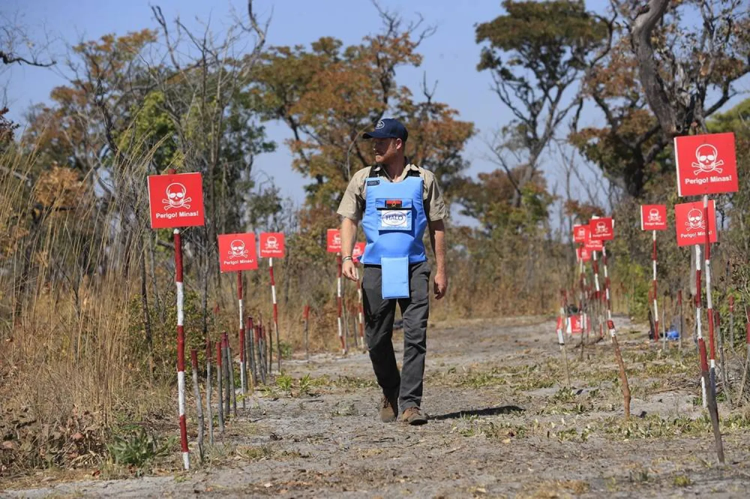  16 July 2025, Angola, Luanda: Prince Harry, Duke of Sussex, walks through a minefield in Cuito Cuanavale. (PA Media/dpa)