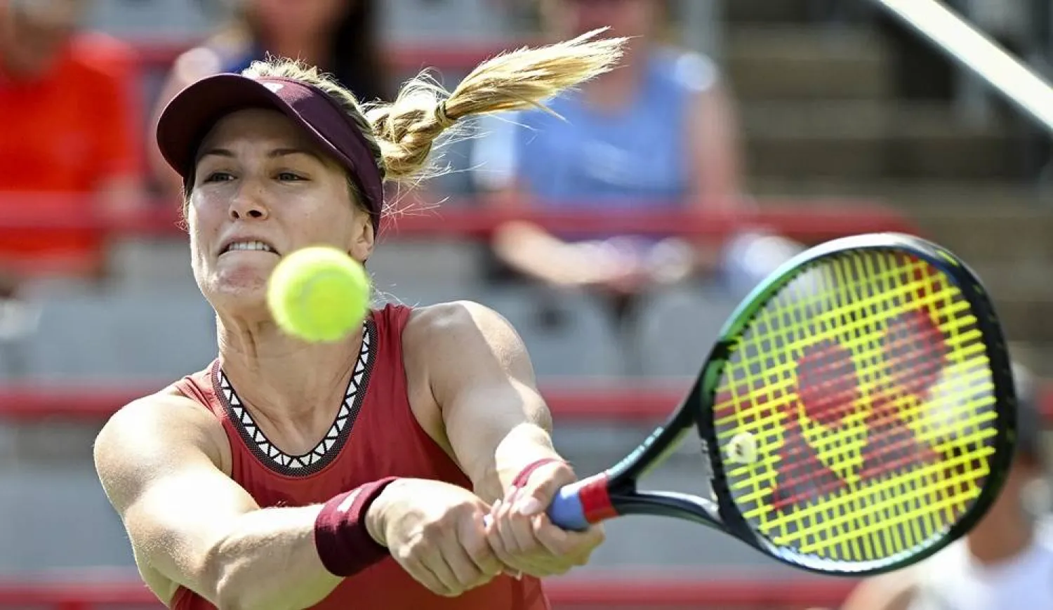 Genie Bouchard, from Canada, returns the ball to Danielle Collins, from the United States, during their qualifying match at the National Bank Open women's tennis tournament in Montreal, Saturday, Aug. 5, 2023. (Graham Hughes/The Canadian Press via AP, File) 