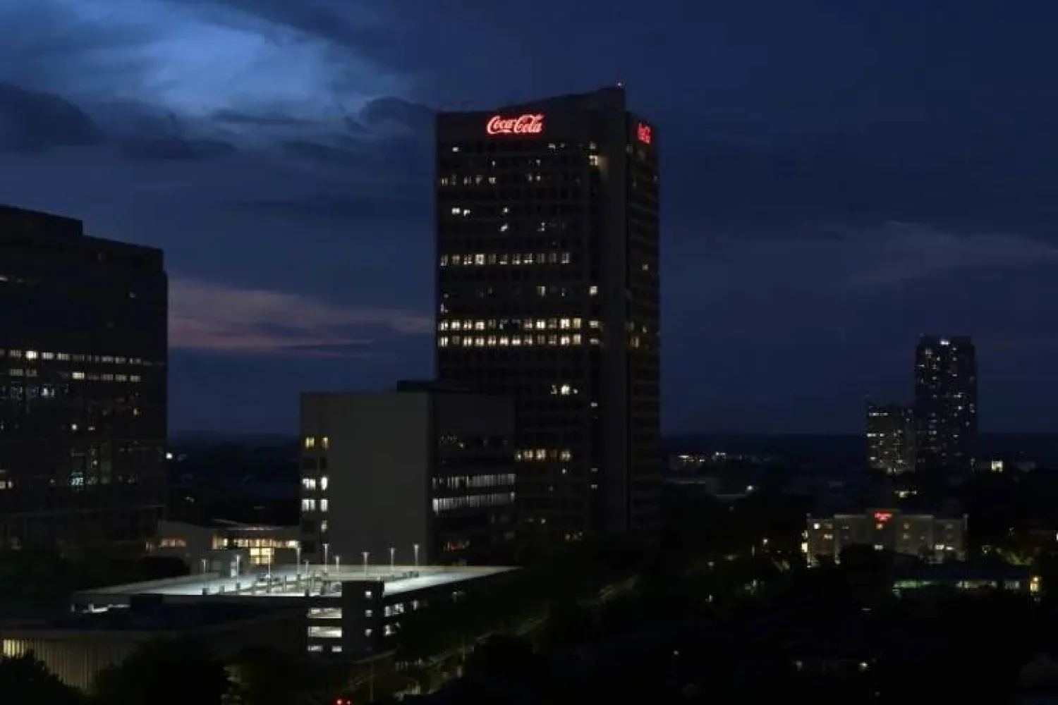 Partial view of the Coca-Cola Company's world headquarters in Atlanta, Georgia on June 29, 2025. JUAN MABROMATA / AFP/File
