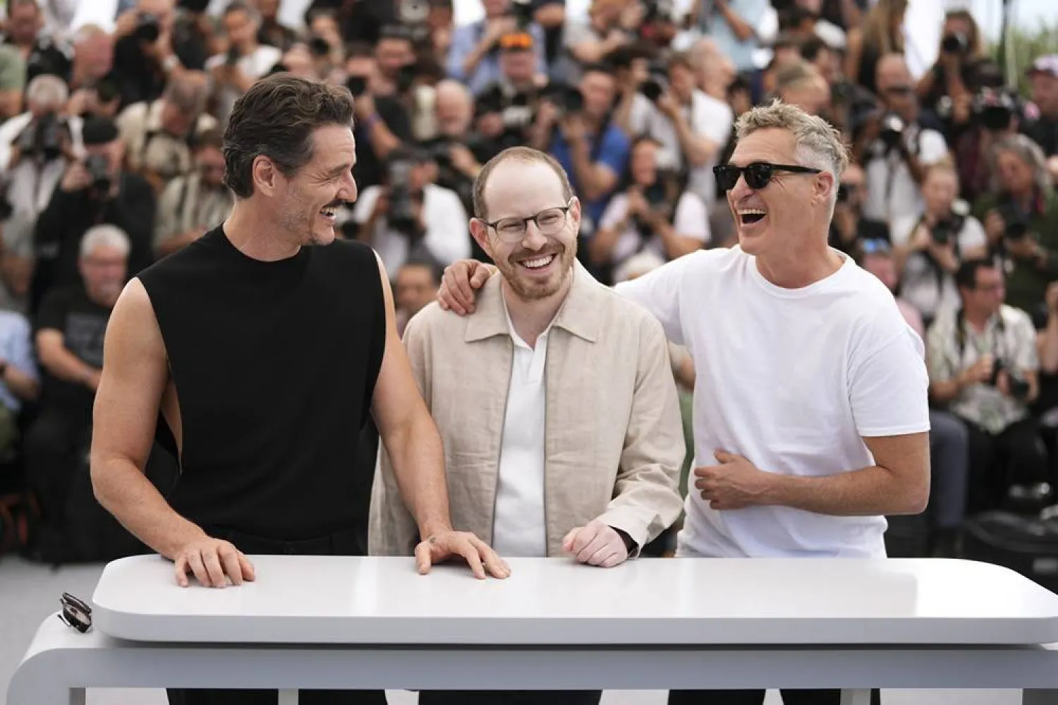 Pedro Pascal, from left, director Ari Aster and Joaquin Phoenix pose for photographers at the photo call for the film "Eddington" at the 78th international film festival, Cannes, southern France, Saturday, May 17, 2025. (AP)