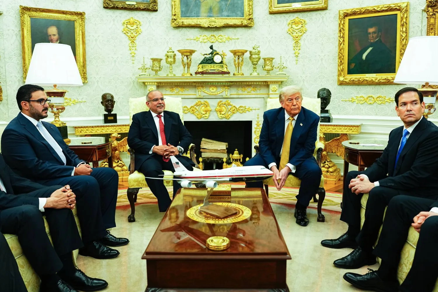 US President Donald J. Trump (C-R) meets Bahrain's Prime Minister and Crown Prince Sheikh Salman bin Hamad al-Khalifa (C-L) in the Oval Office of the White House in Washington, DC, USA, 16 July 2025.  EPA/AARON SCHWARTZ / POOL