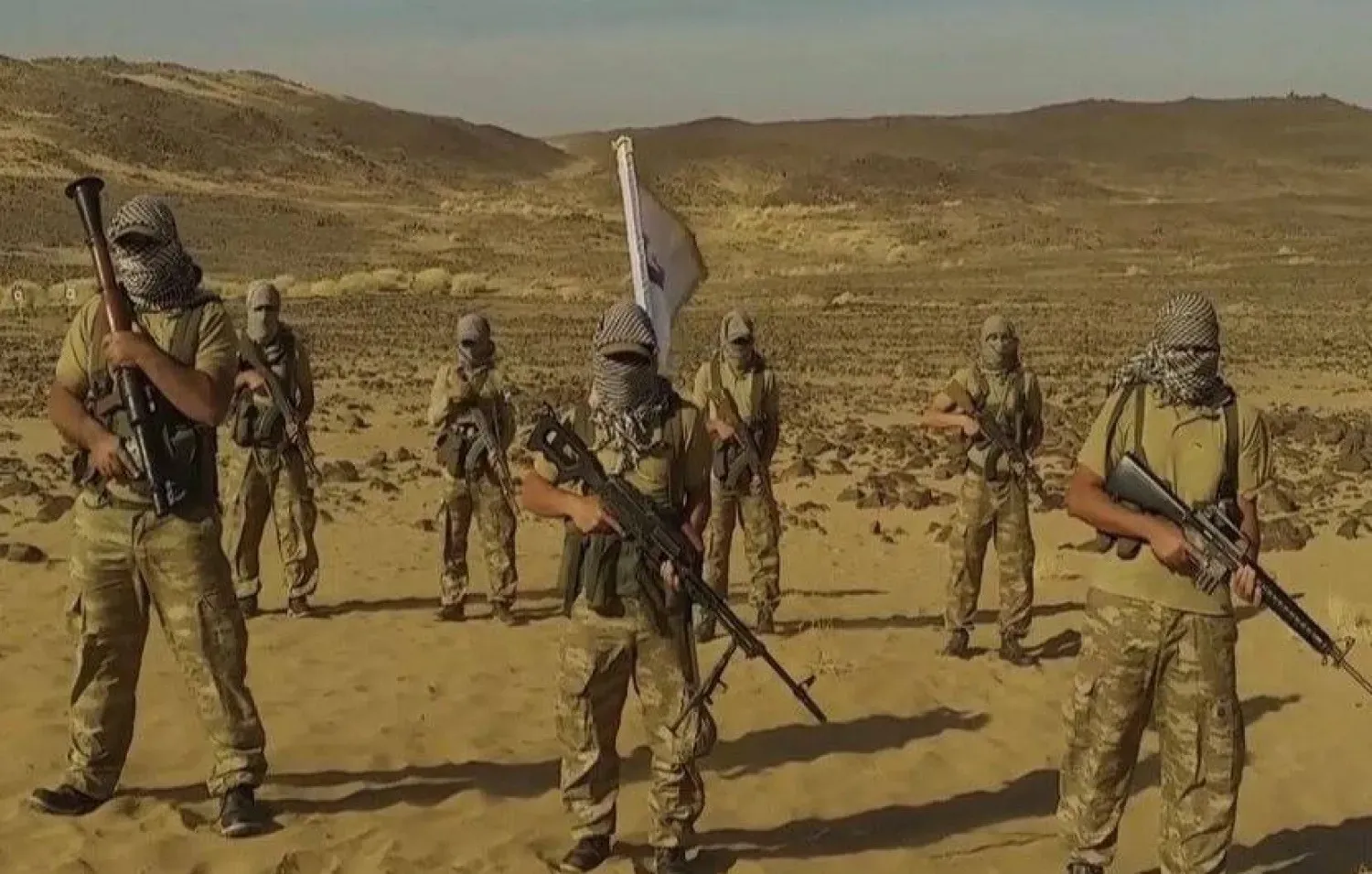 A still image from a circulated video in which the Hasm movement announces its intention to resume operations in Egypt