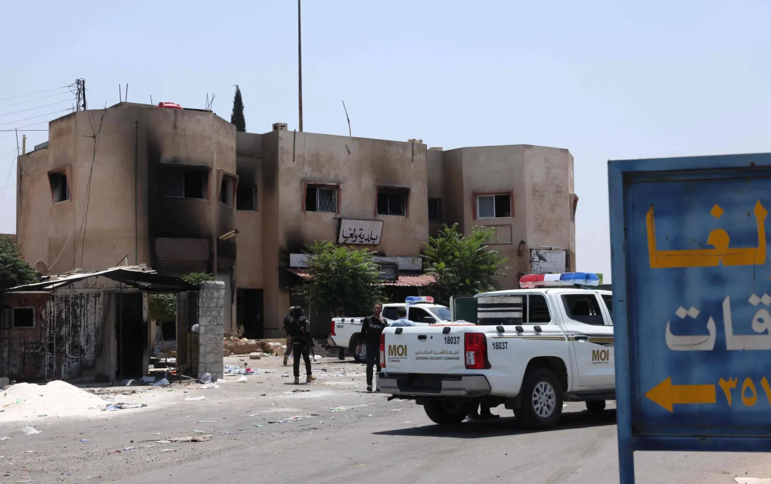 قوات حكومية سورية في نقطة حراسة بقرية ولغا بالقرب من السويداء (أ.ف.ب)