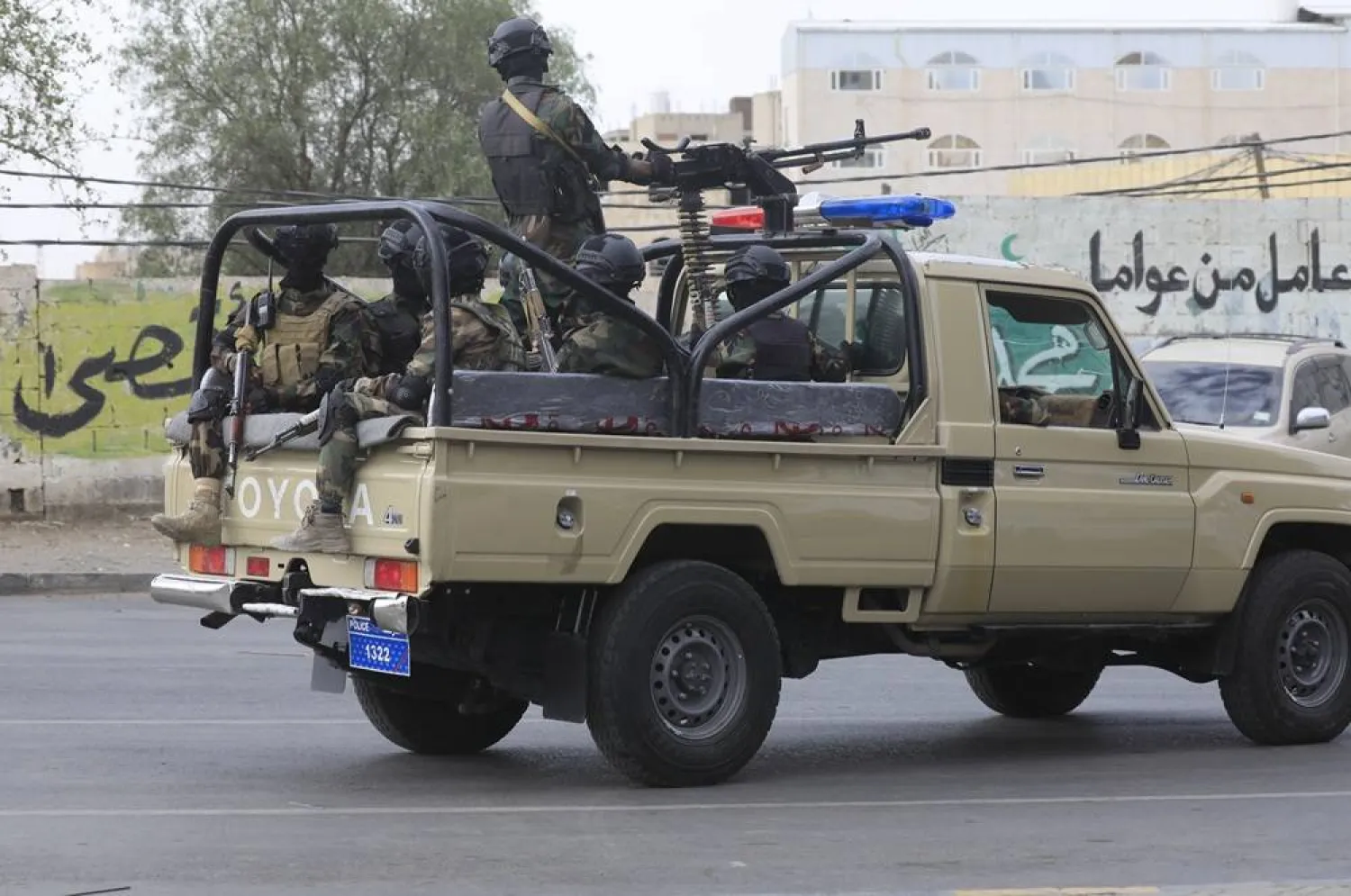 Houthi members ride a pick-up truck while on patrol amid tensions with Israel, in Sanaa, Yemen, 18 July 2025. (EPA)