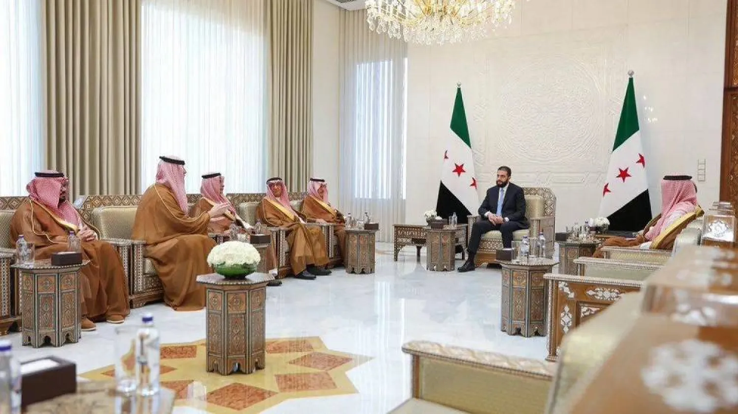 Syrian President Ahmed al-Sharaa meets with a visiting Saudi business delegation. (Asharq Al-Awsat) 