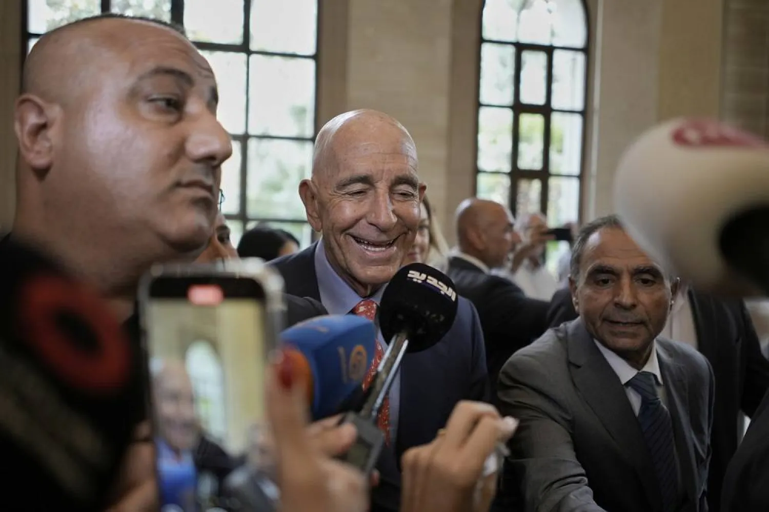 US Ambassador to Türkiye and Special Envoy to Syria Tom Barrack, center, speaks with journalists after meeting with Lebanese parliament Speaker Nabih Berri, in Beirut, Lebanon, Tuesday, July 22, 2025. (AP)