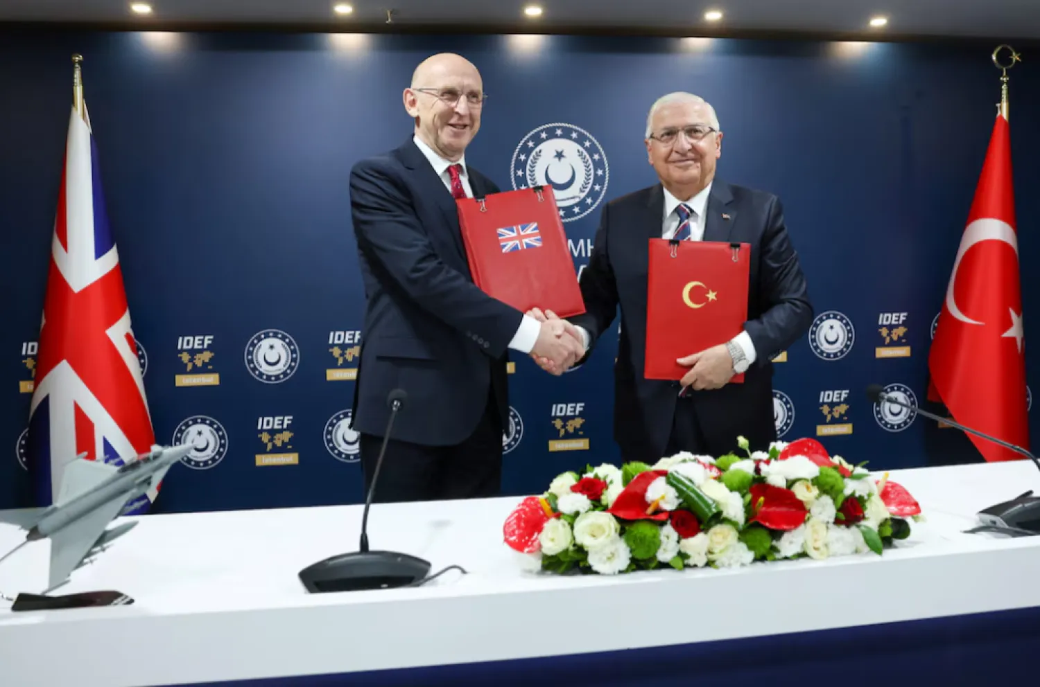 Turkish Defense Minister Yasar Guler and British Defense Secretary John Healey attend a signing ceremony on the sidelines of the International Defense Industry Fair (IDEF) in Istanbul, Turkey, July 23, 2025. REUTERS/Dilara Senkaya
