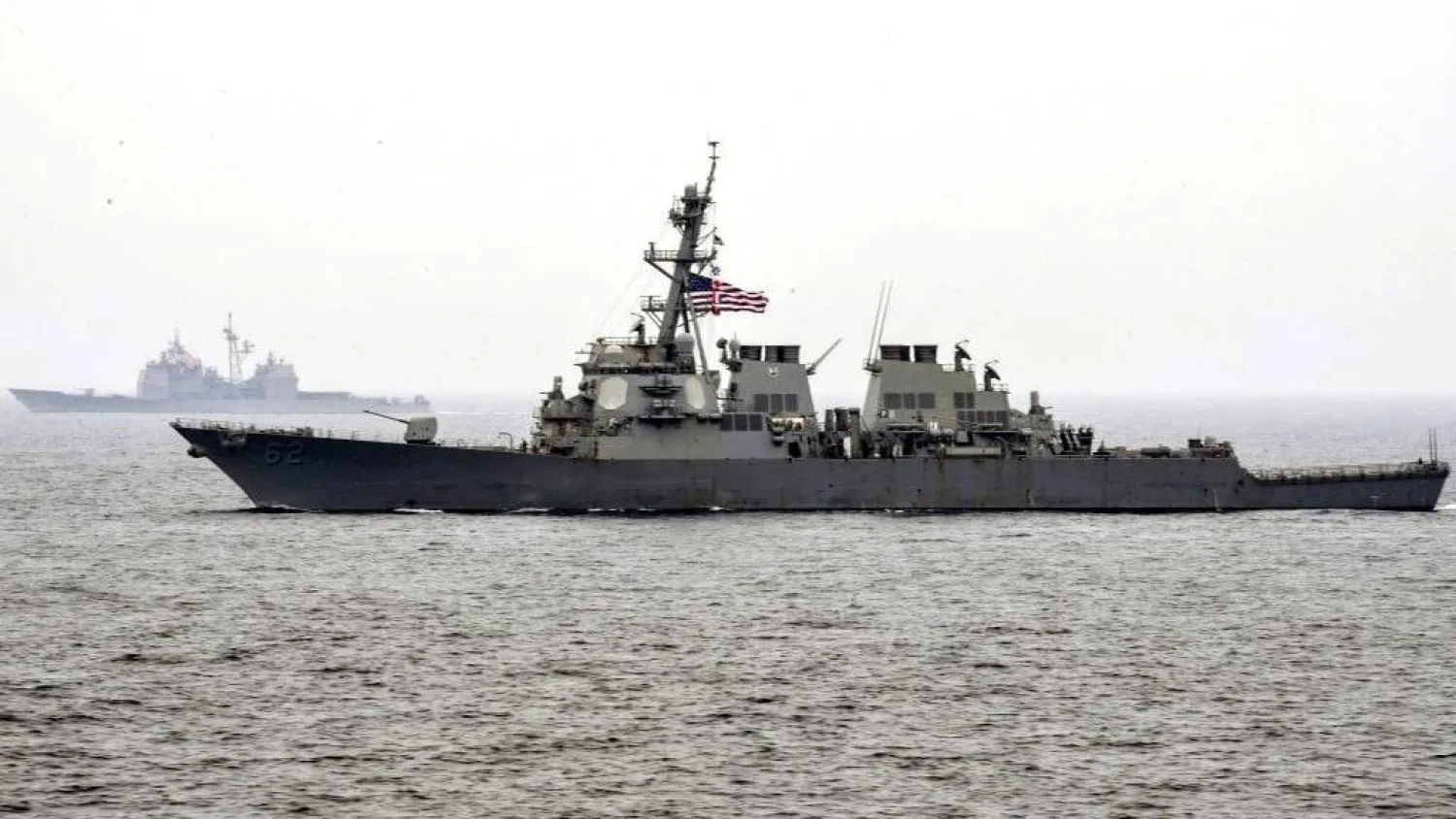 In this June 1, 2017 photo, the guided-missile destroyer USS Fitzgerald, foreground, (DDG 62) makes its way with the Carl Vinson Carrier Strike Group, through the Sea of Japan. (Mass Communication Specialist 3rd Class Kelsey L. Adams/US Navy via AP) 