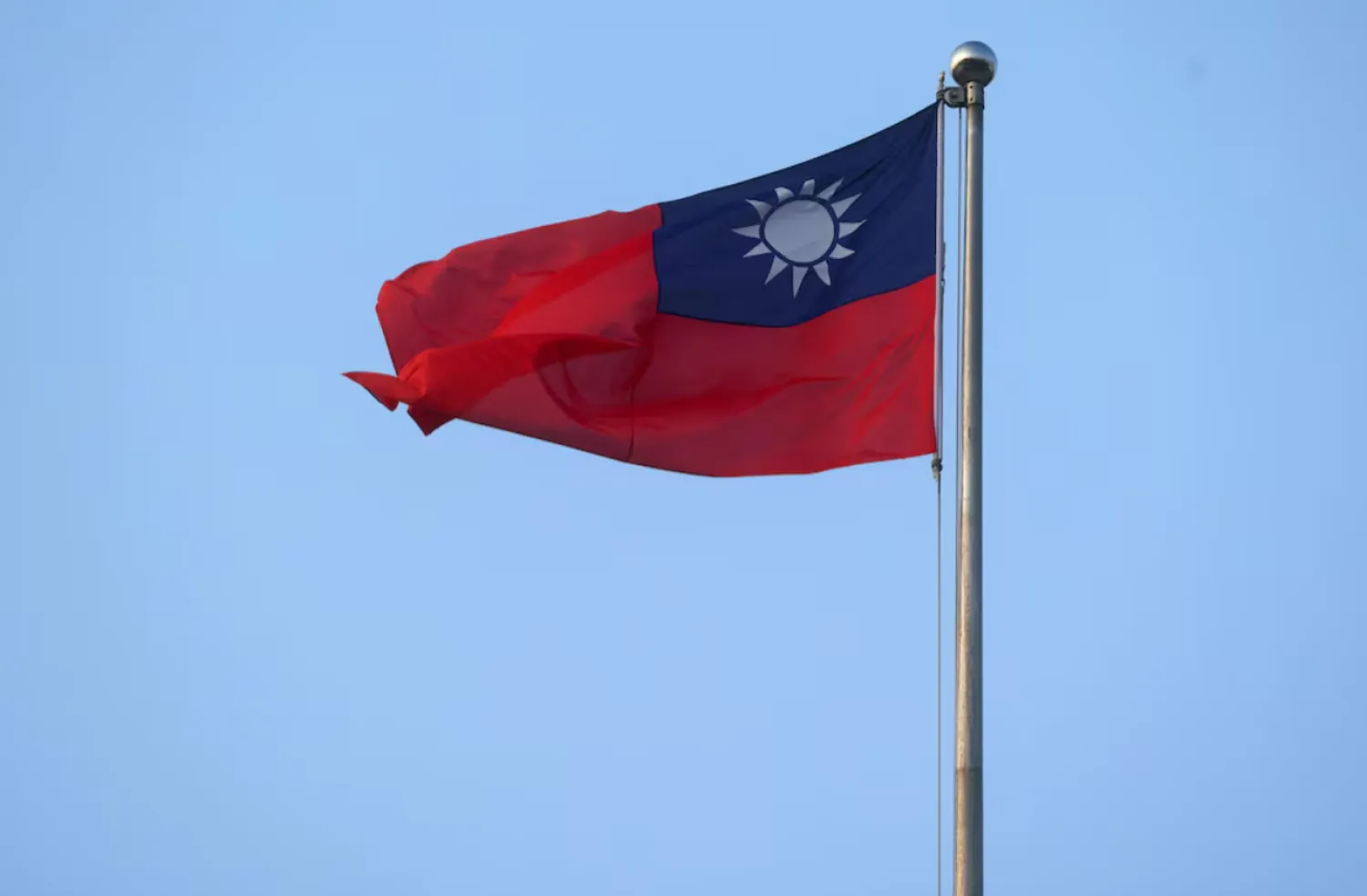 A Taiwan flag can be seen at Liberty Square in Taipei, Taiwan, July 28, 2022. REUTERS/Ann Wang/File Photo 