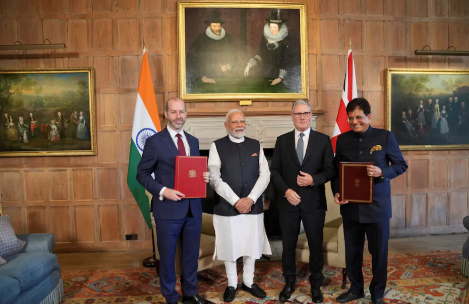 Britain's Prime Minister Keir Starmer and Prime Minister Narendra Modi of India pose for a photo  - Reuters
