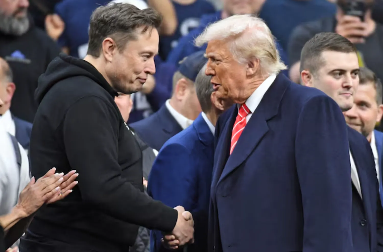 Mar 22, 2025; Philadelphia, PA, USA; Elon Musk and President Donald Trump during the Division I Men's Wrestling Championship held at Wells Fargo Center. Mandatory Credit: Eric Hartline-Imagn Images/File Photo