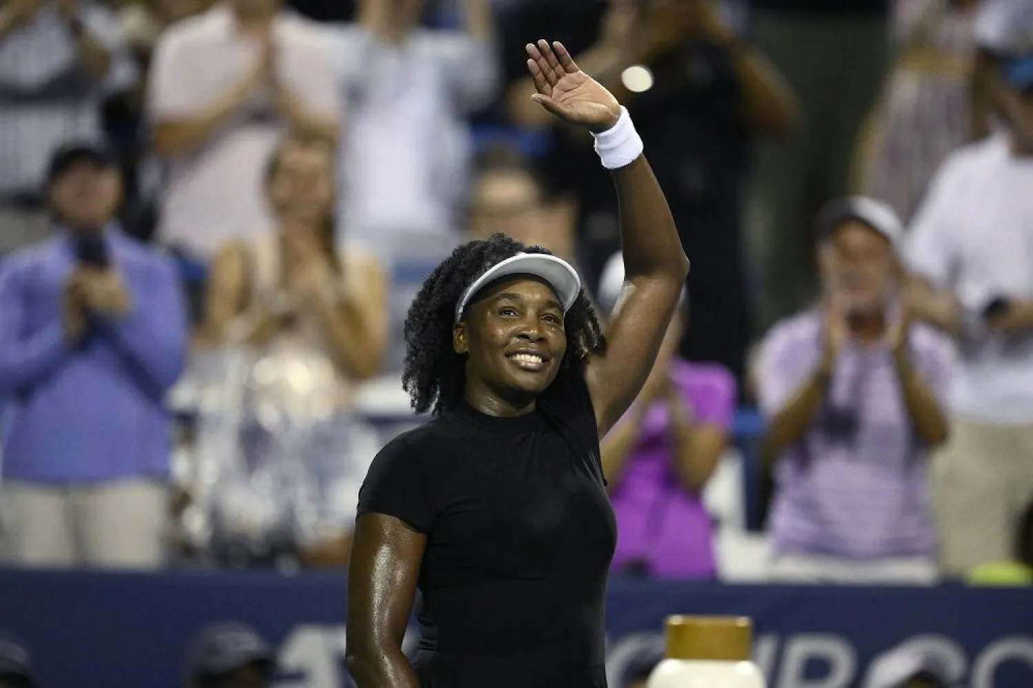Venus Williams waves to the crowd after she lost to Magdalena Frech, of Poland, during a match at the Citi Open tennis tournament Thursday, July 24, 2025, in Washington. (AP)