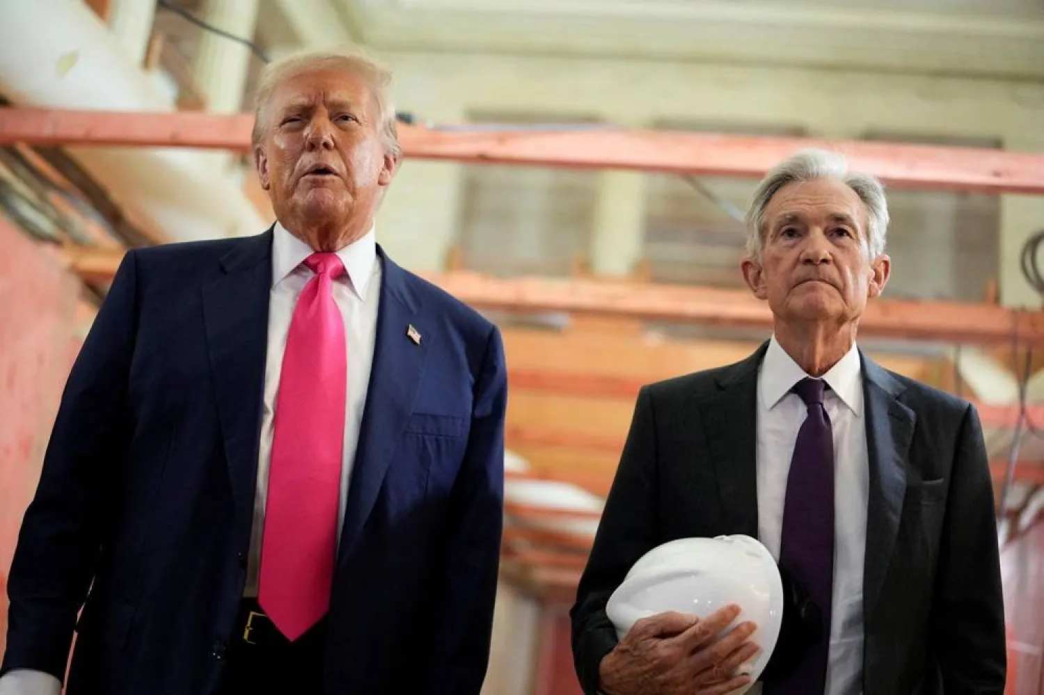US President Donald Trump and Federal Reserve Chair Jerome Powell speak during a tour of the Federal Reserve Board building, which is currently undergoing renovations, in Washington, DC, US, July 24, 2025. (Reuters)