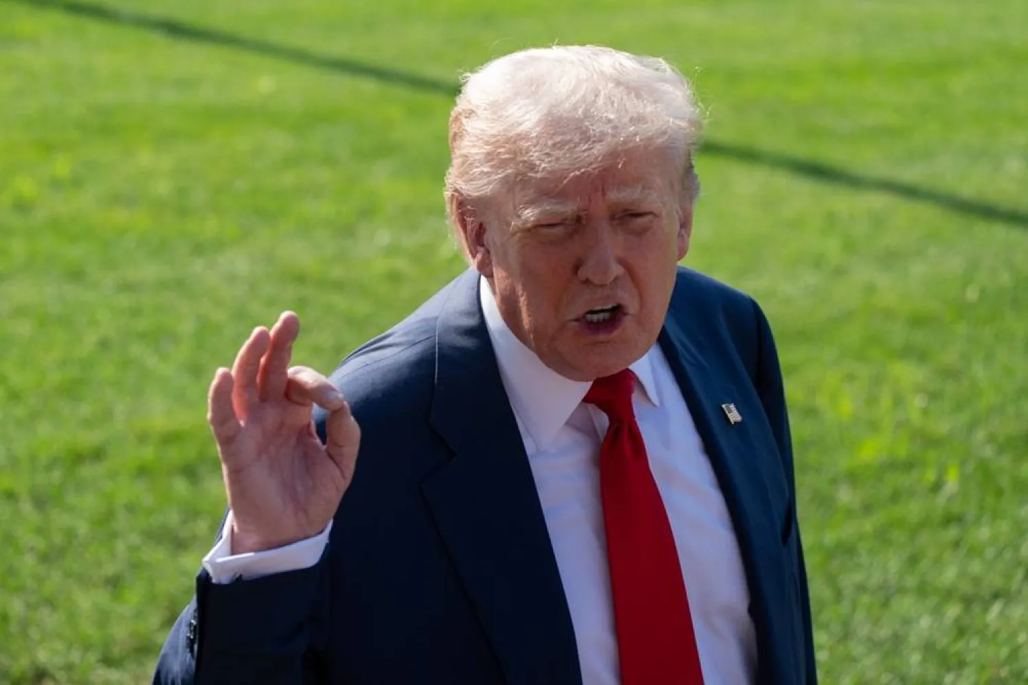  25 July 2025, US, Washington: US President Donald Trump speaks to the media before heading to Scotland this weekend for meetings and to play golf. (dpa) 