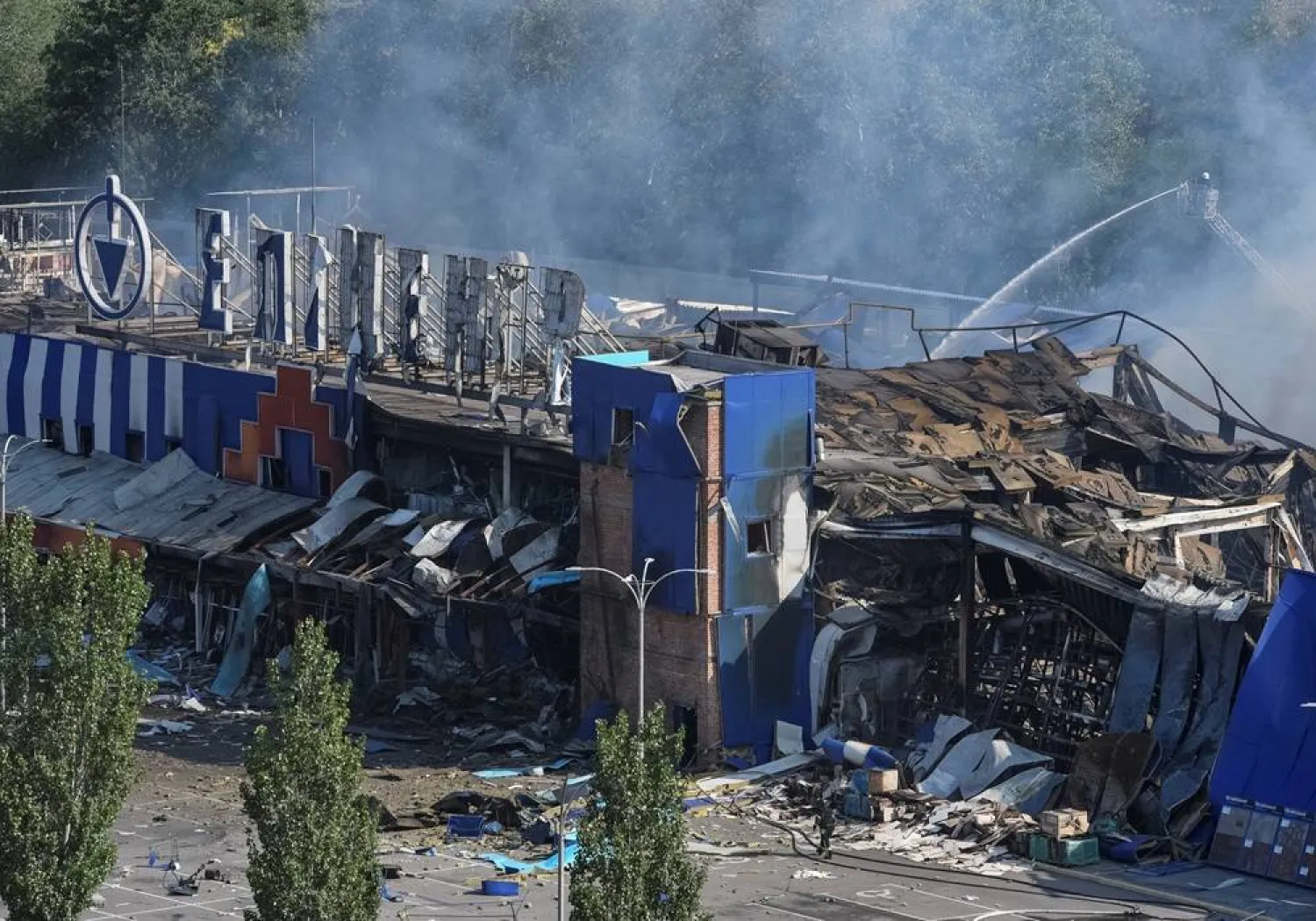  A firefighter works at the site of a household item shopping mall which was hit by a Russian missile strike, amid Russia's attack on Ukraine, in the city of Kamianske, Dnipro region, Ukraine July 26, 2025. (Reuters)