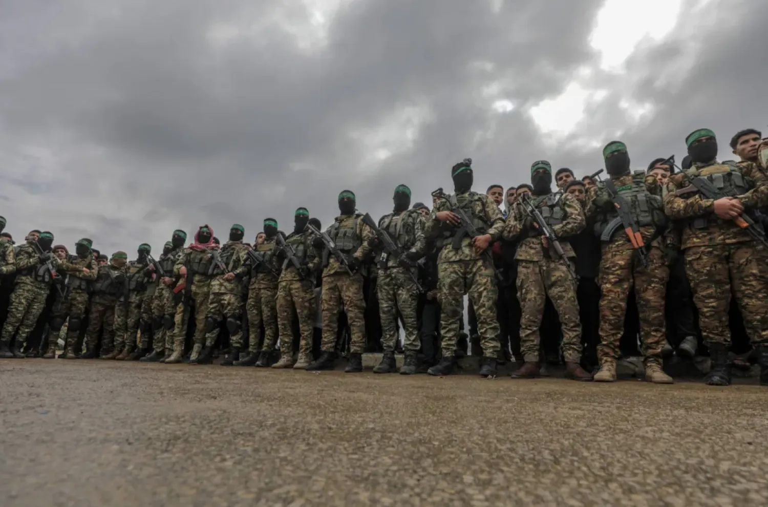 Members of the Al-Qassam Brigades, the military wing of Hamas, at the Al-Nuseirat Camp, central Gaza, on February 22. (EPA)
