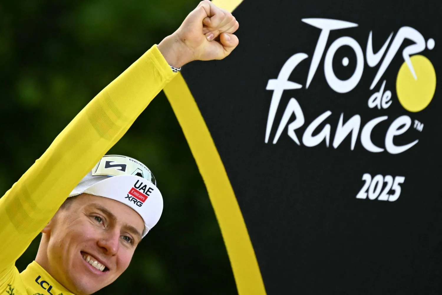 السلوفيني تادي بوغاتشار بطل تور دي فرانس للدراجات للمرة الرابعة (أ.ف.ب)