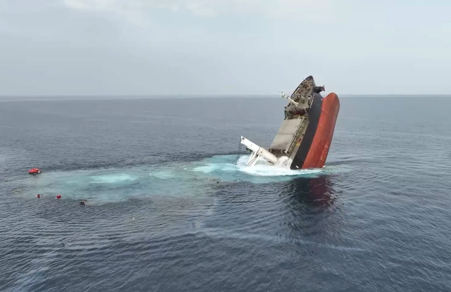 A screen grab taken from a handout video released by the Houthis military media center on 09 July 2025 shows the Liberian-flagged bulker, Eternity C, sinking after being attacked in the Red Sea off the port city of Hodeidah, Yemen, 07 July 2025. EPA/HOUTHIS MILITARY MEDIA CENTER HANDOUT 