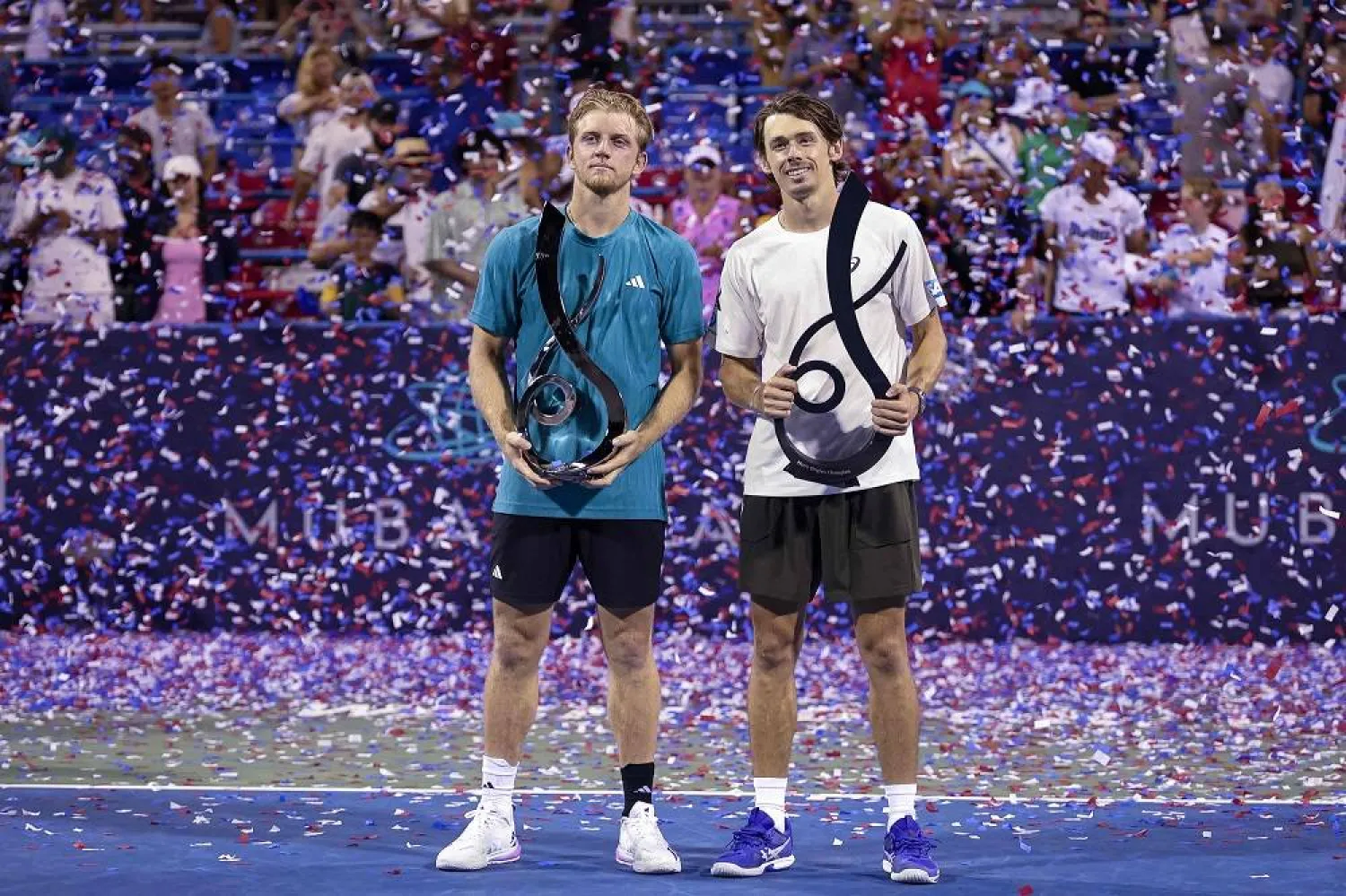(L-R) Alejandro Davidovich Fokina of Spain and Alex De Minaur of Australia pose with the men's singles trophies after the men's singles finals match on the final day of the Mubadala Citi DC Open 2025 at William H.G. FitzGerald Tennis Center on July 27, 2025 in Washington, DC. (Getty Images/AFP)