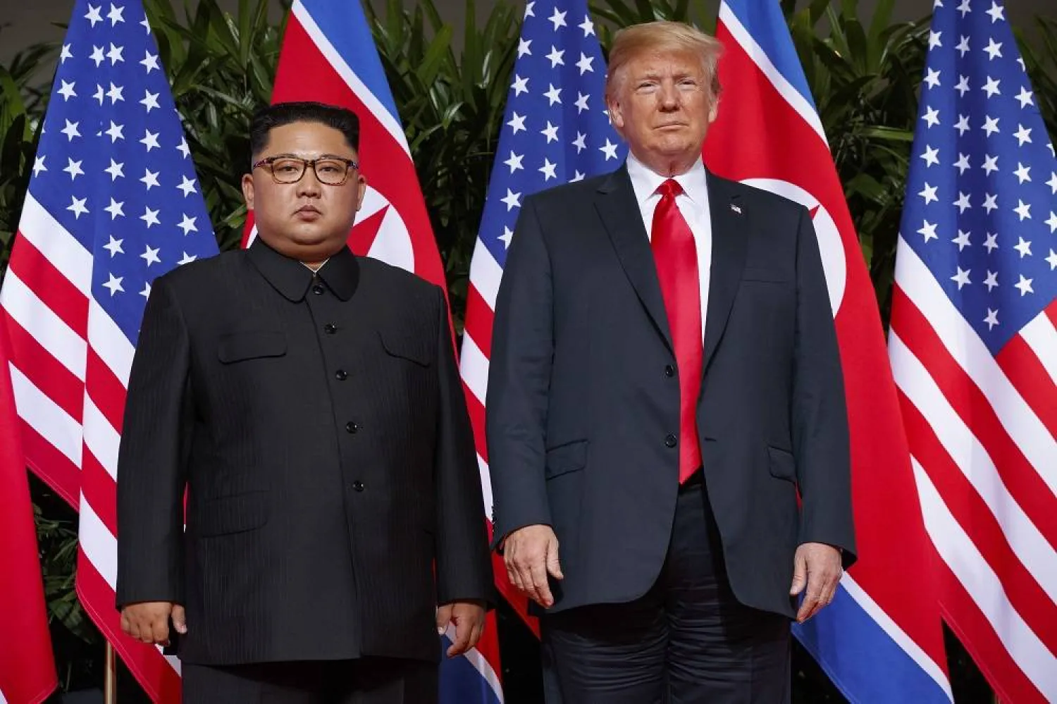 US President Donald Trump, right, meets with North Korean leader Kim Jong Un on Sentosa Island, in Singapore, June 12, 2018. (AP)