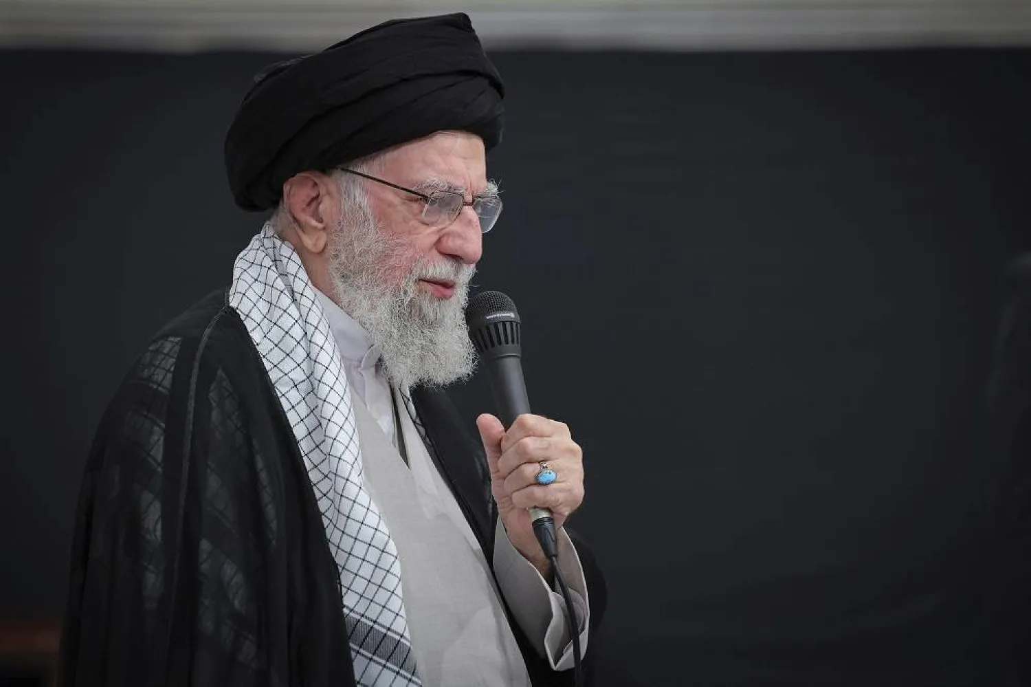 In this photo released by an official website of the office of the Iranian supreme leader, Supreme Leader Ali Khamenei speaks during a ceremony commemorating military personnel, nuclear scientists and other people who were killed during Israeli airstrikes in June, in Tehran, Iran, Tuesday, July 29, 2025. (Office of the Iranian Supreme Leader via AP)