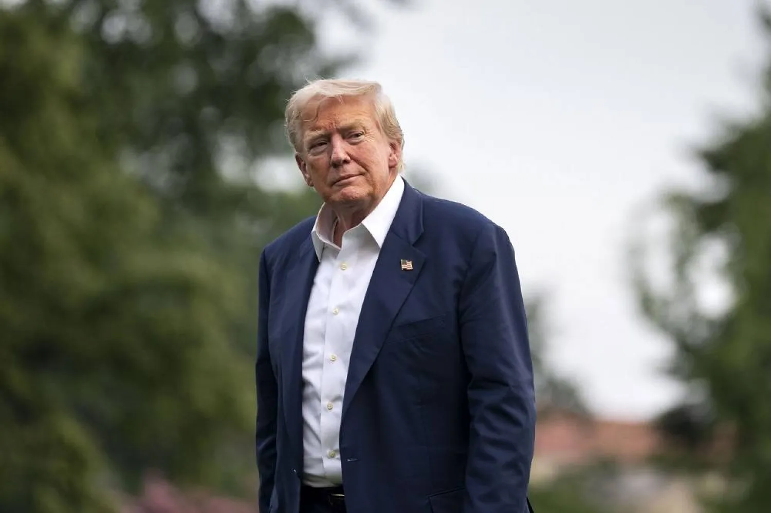 US President Donald Trump walks across the South Lawn after exiting Marine One at the White House in Washington, DC, USA, 29 July 2025. (EPA)