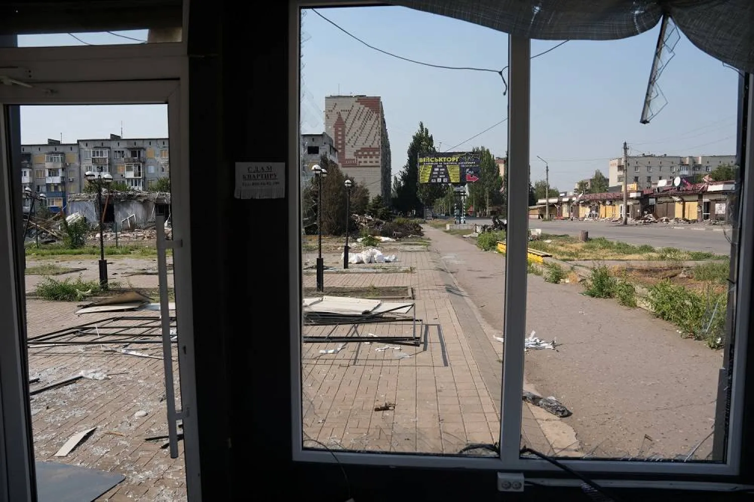 A view shows buildings damaged by Russian military strikes in the frontline town of Dobropillia, amid Russia's attack on Ukraine, in Donetsk region, Ukraine July 29, 2025. (Reuters) 