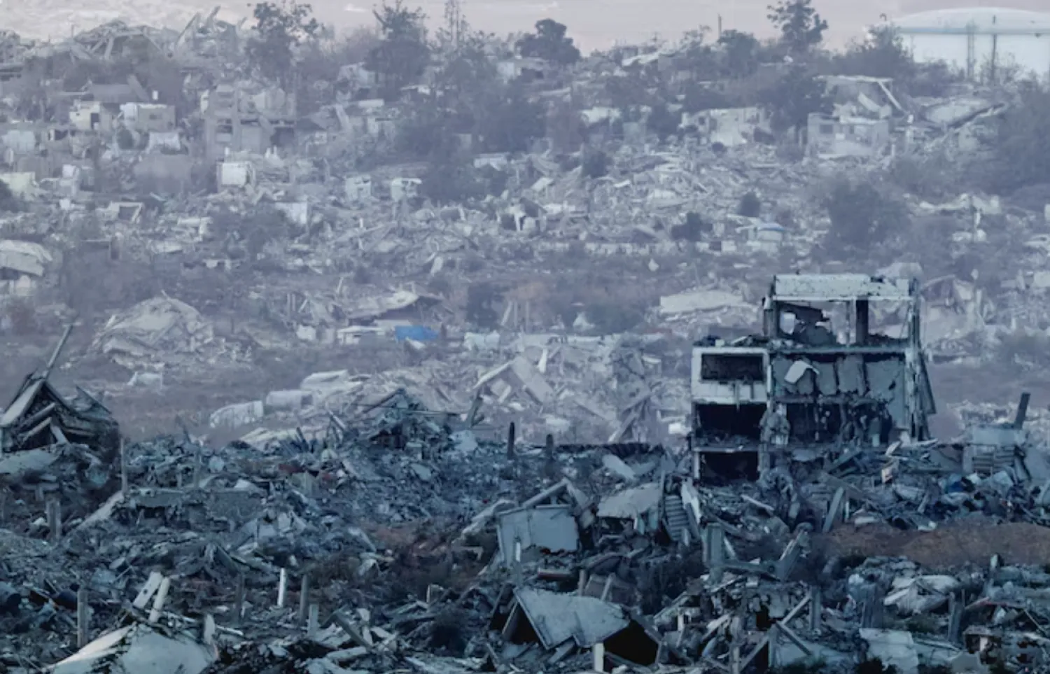 Destroyed buildings lie in Gaza, as seen from the Israeli side of the border, July 28, 2025. REUTERS/Amir Cohen 