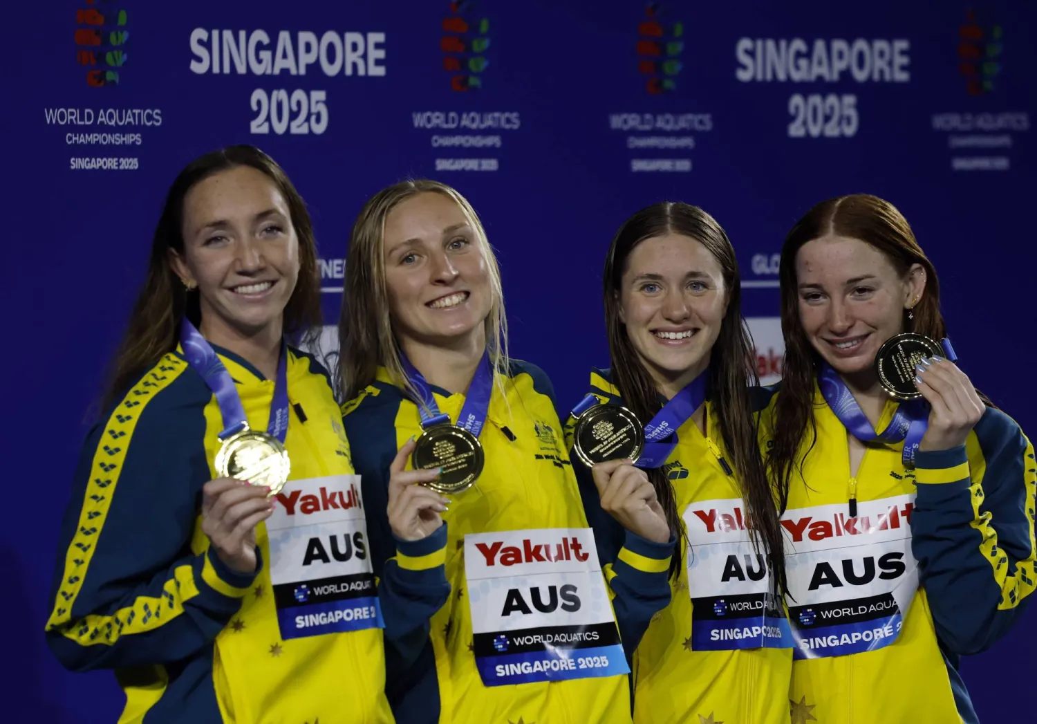 من تتويج المنتخب الأسترالي بالميدالية الذهبية (إ.ب.أ)