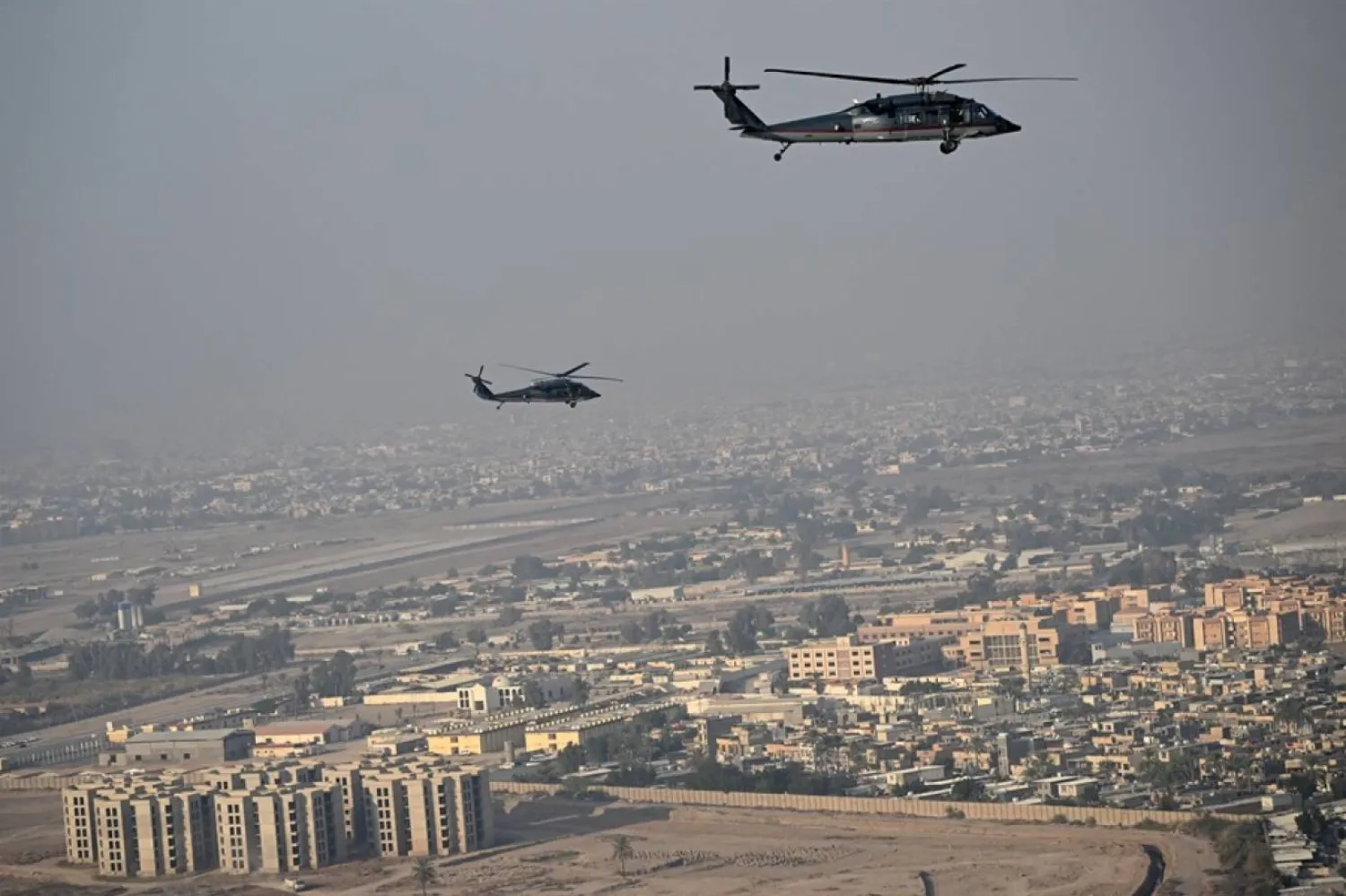 ABD'nin Irak’tan çekilmesi Bağdat'ı tedirgin ederken devlet ile silahlı gruplar arasındaki kırılgan dengeyi ortaya koyuyor (AFP)
