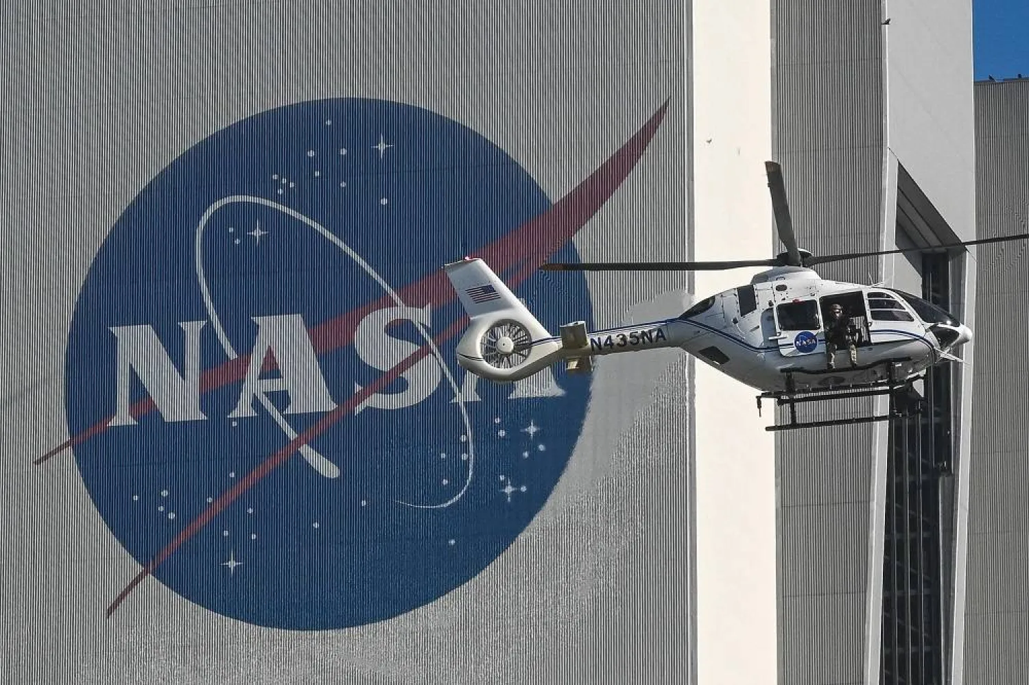 A NASA helicopter with armed security escorts the Crew-11 motorcade to launch pad LC-39A at Kennedy Space Center ahead of the Crew-11 Mission in Cape Canaveral, Florida, on July 31, 2025. (AFP)