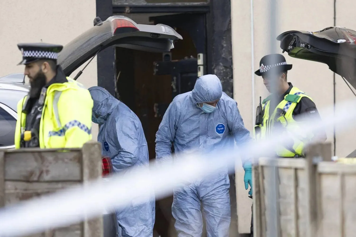 Police forensic science officers search a house in Rochdale on 4 May. (Ryan Jenkinson/Getty Images) 