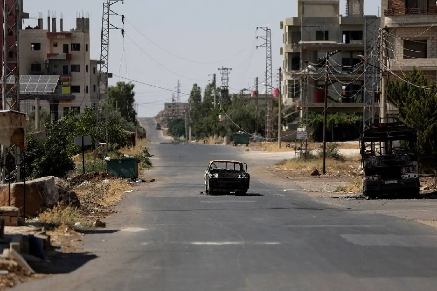 A view shows remains of destroyed vehicles, following deadly clashes between Druze fighters, Bedouin tribes and government forces, in Syria's predominantly Druze city of Sweida, Syria July 25, 2025. (Reuters) 