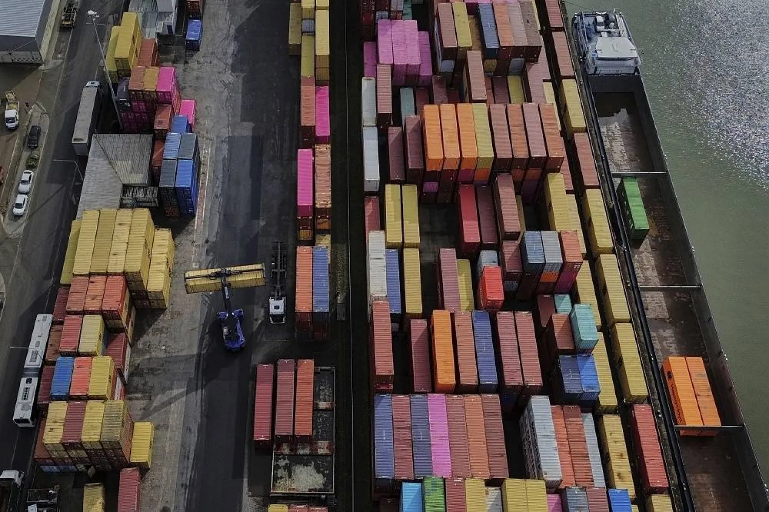 Containers are piled up in a cargo terminal in Frankfurt, Germany, Friday, Aug. 1, 2025. (AP)