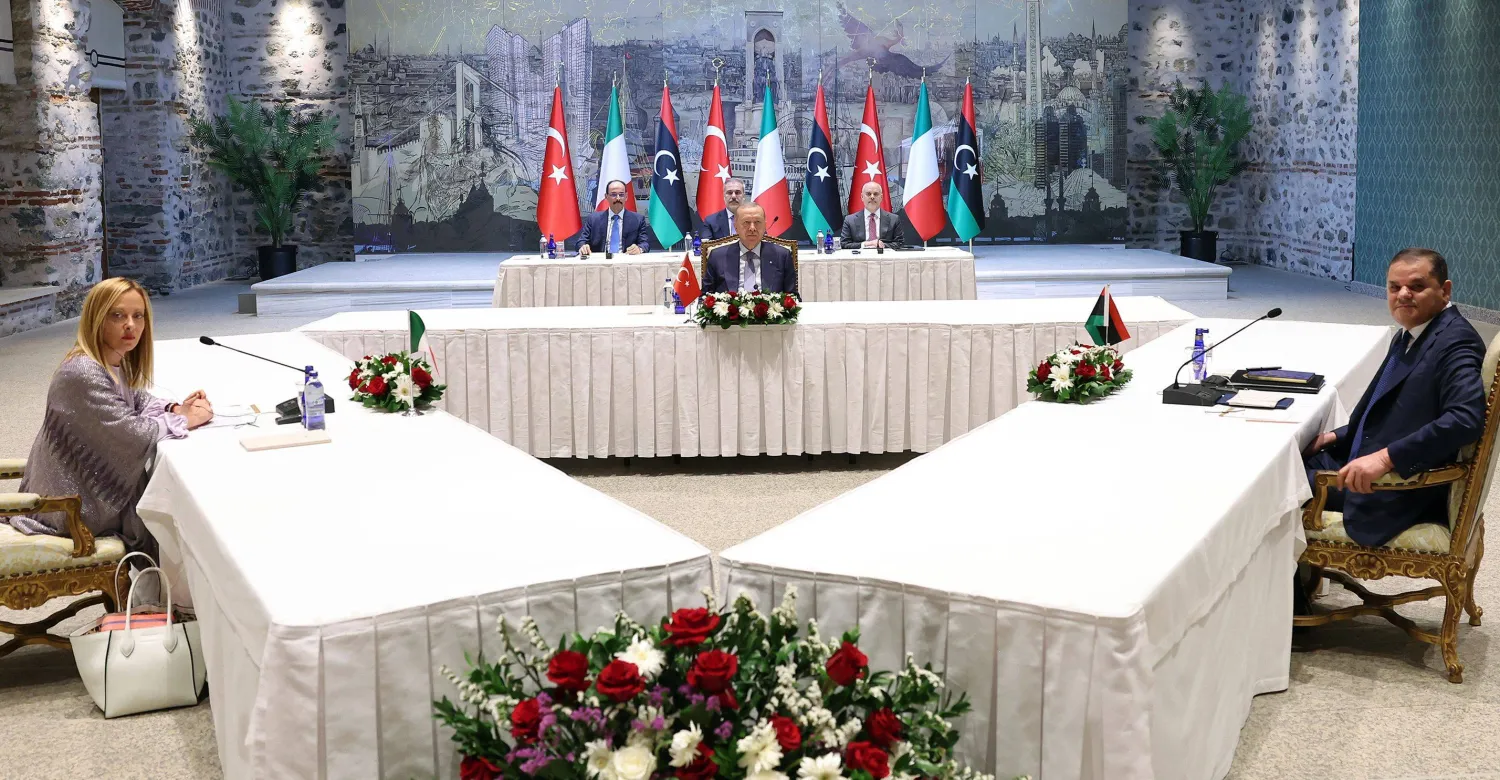 This handout photograph taken and released by Turkish presidential press service on August 1, 2025, shows Türkiye's President Recep Tayyip Erdogan (C), Italy's Prime Minister Giorgia Meloni (L) and Libya's Tripoli-based Government of National Unity (GNU) Prime Minister Abdulhamid Dbeibah attend a trilateral meeting in Istanbul. (Photo by HANDOUT / TURKISH PRESIDENTIAL PRESS SERVICE / AFP)