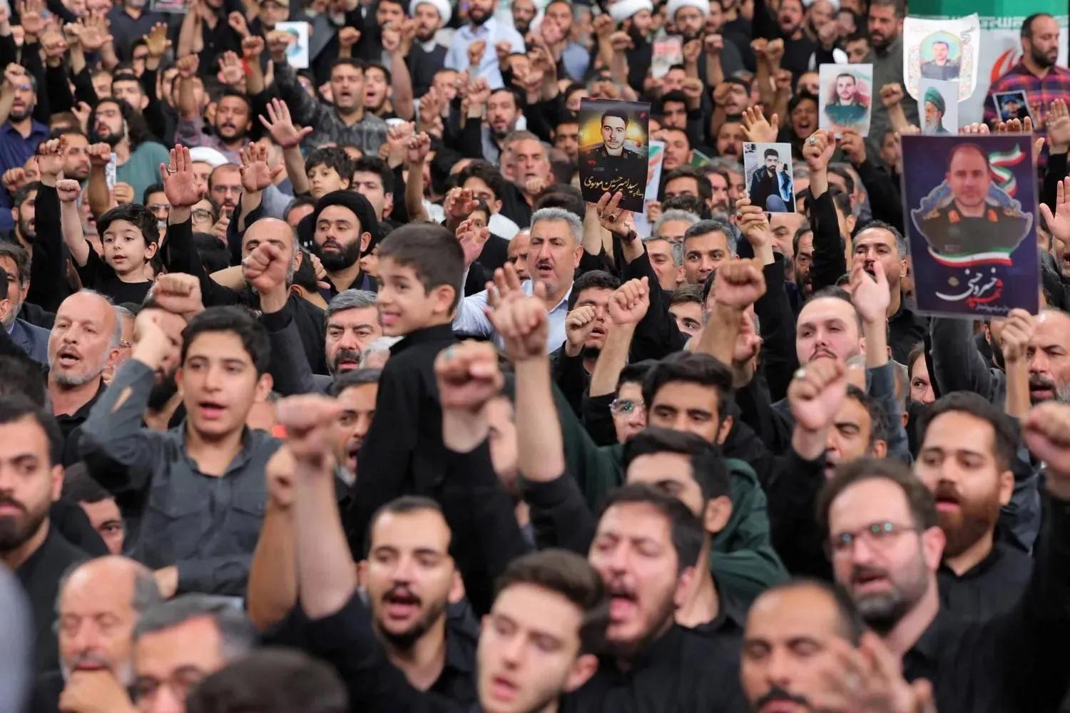 Iranians attend funeral procession for top Iranian military commanders, nuclear scientists and some of the civilians killed during the 12-day war with Israel (Reuters) 