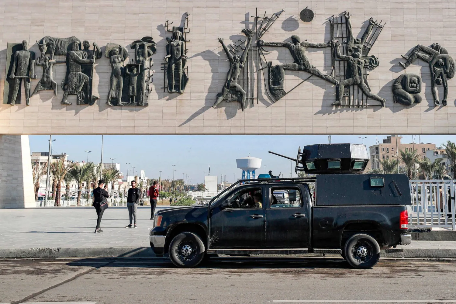 قوات أمن في ساحة التحرير وسط بغداد (أ.ف.ب)