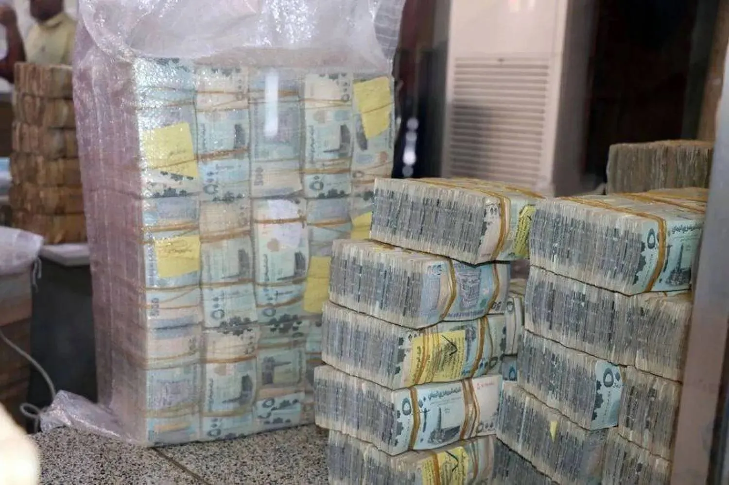 Bundles of banknotes issued by the Yemeni government at the Central Bank headquarters in Aden. (Reuters)